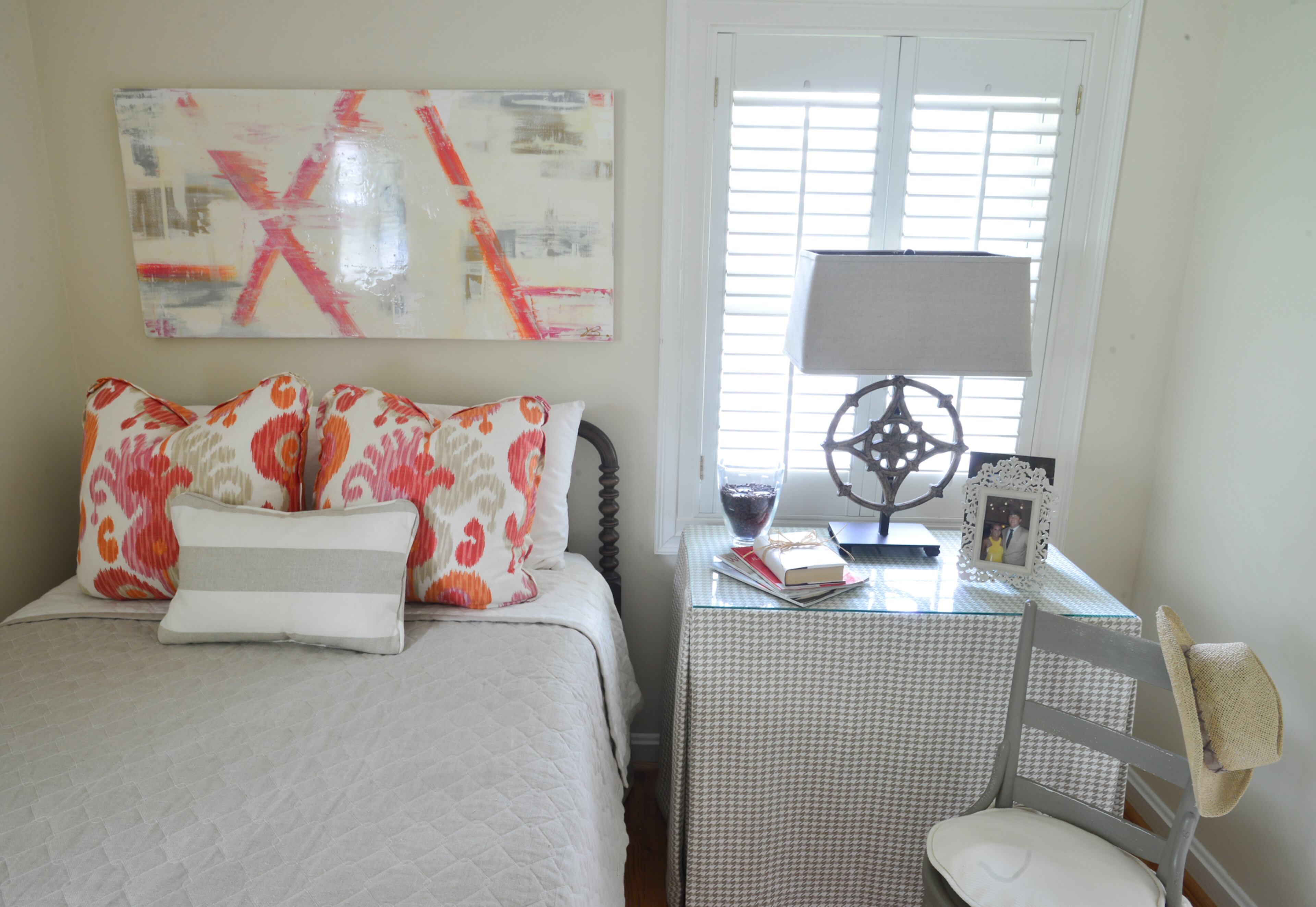 The three-quarter bed - an unusual size - in the guest bedroom is Betsy Clay's childhood bed. "I love that it's the perfect size for the bedroom. It's more of a traditional bed but framed with the modern art to give it a new look," she said.
