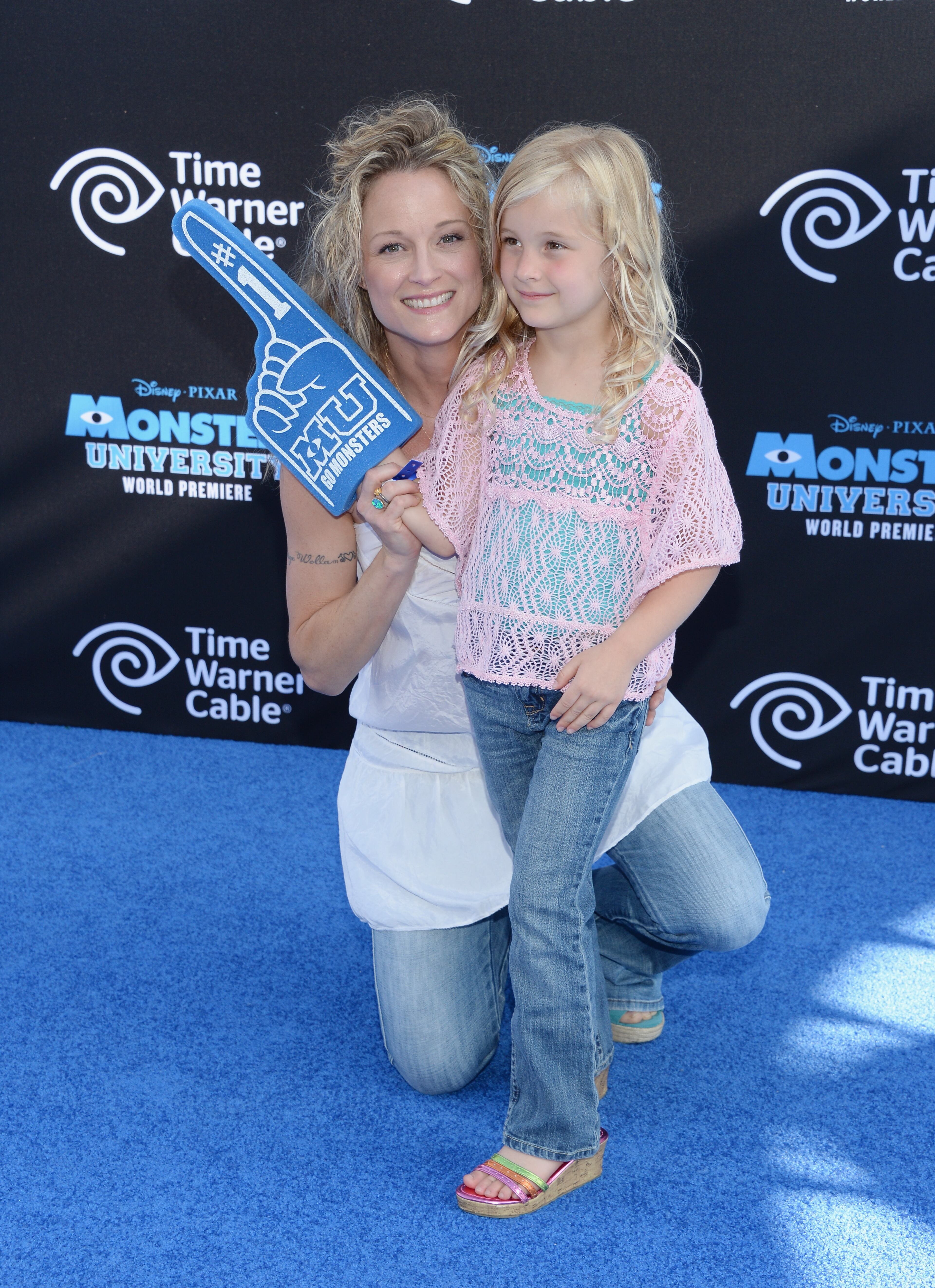 Actress Teri Polo and daughter Bayley Wollam attend the premiere of Disney Pixar's "Monsters University" at the El Capitan Theatre on June 17, 2013 in Hollywood, California.