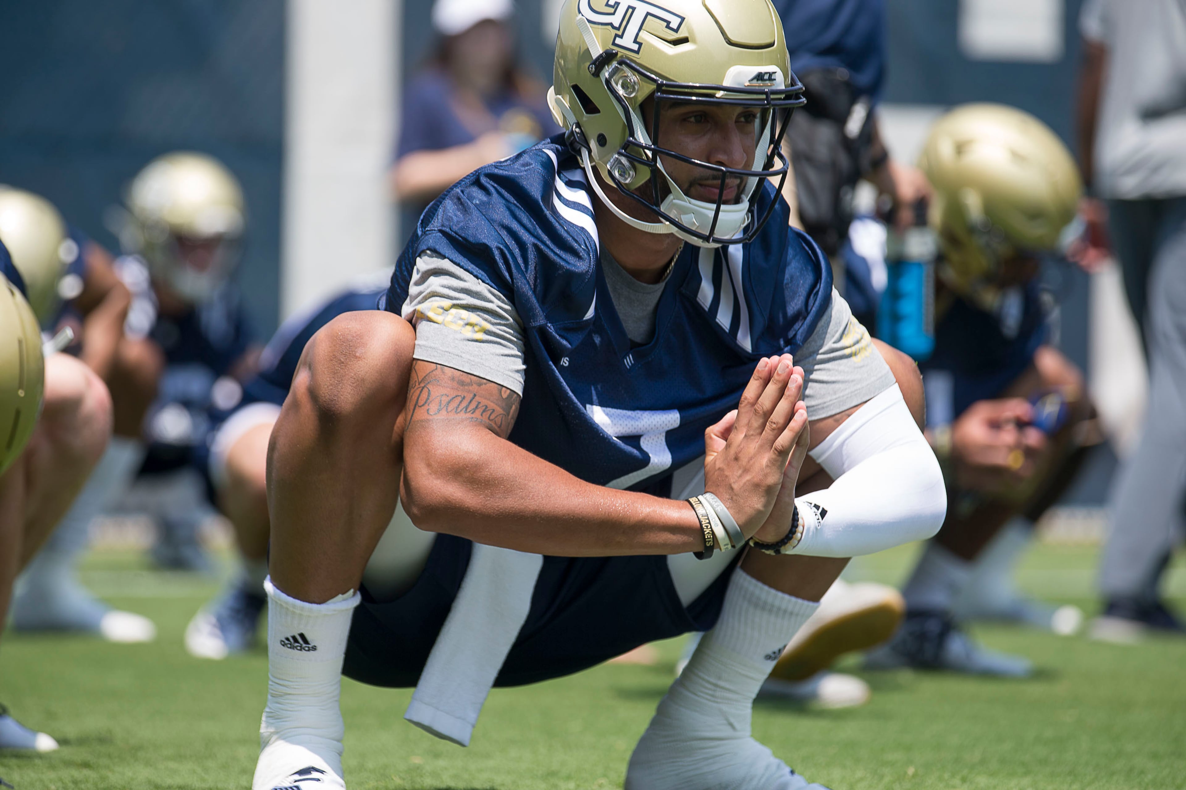 Georgia Tech quarterback Lucas Johnson (7) stretches. (Alyssa Pointer/alyssa.pointer@ajc.com)