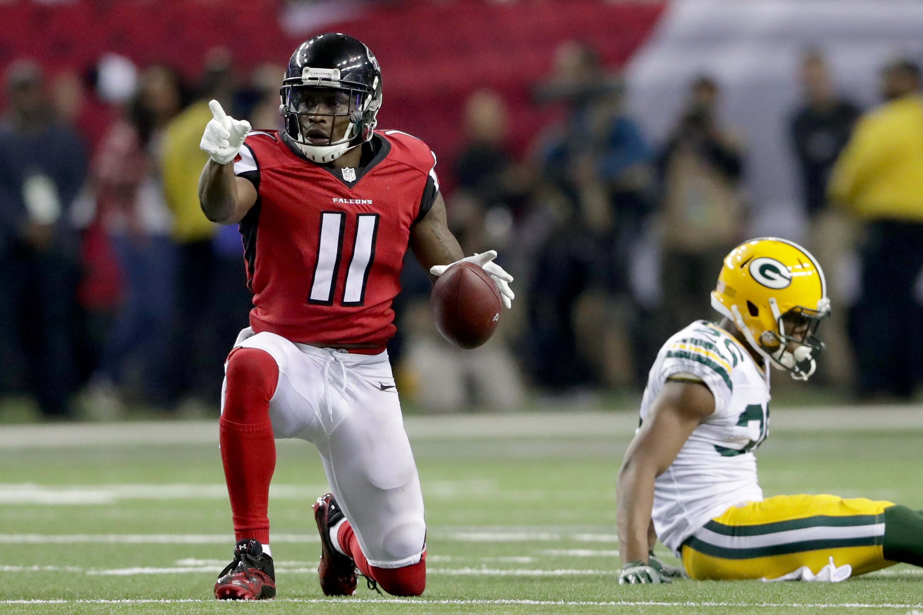 ATLANTA, GA - JANUARY 22: Julio Jones #11 of the Atlanta Falcons signals a first down in the third quarter against the Green Bay Packers in the NFC Championship Game at the Georgia Dome on January 22, 2017 in Atlanta, Georgia. (Photo by Streeter Lecka/Getty Images)
