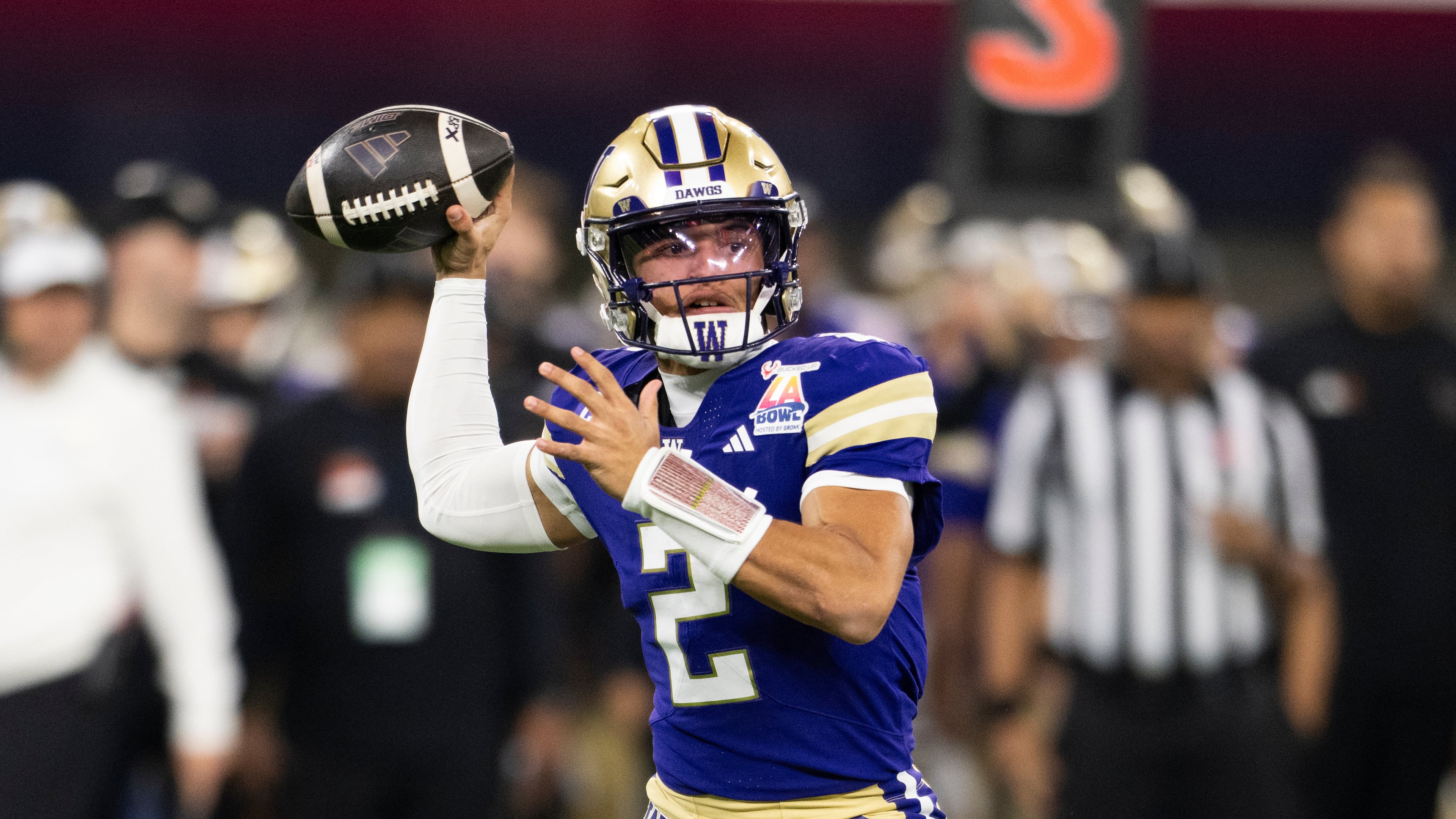 Washington quarterback Demond Williams Jr. (2) throws a pass during the LA Bowl NCAA college football game against Boise State Saturday, Dec. 13, 2025, in Inglewood, Calif. (AP Photo/Kyusung Gong)