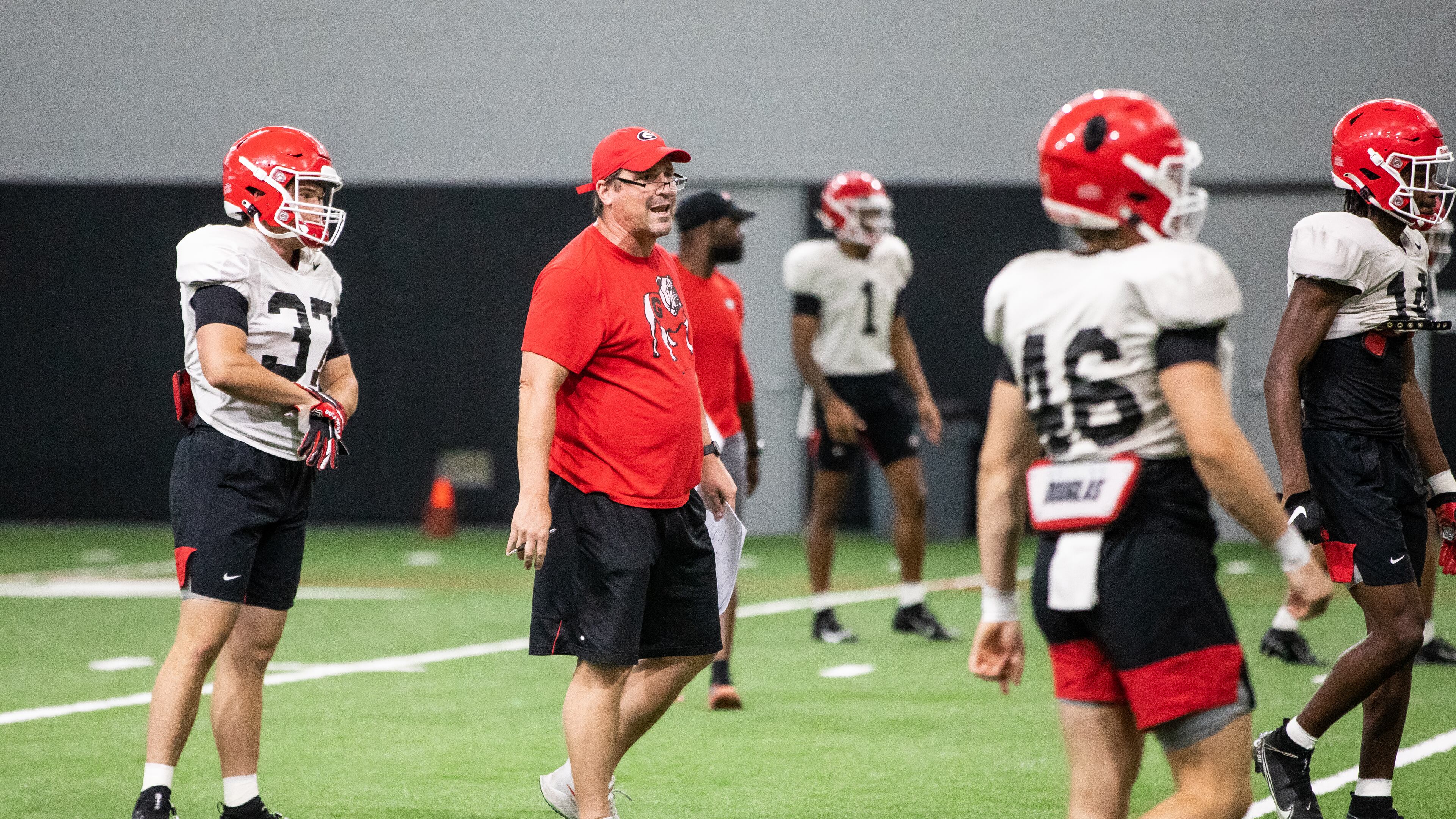 Georgia senior defensive analyst Will Muschamp directs special teams players inside the 'House of Payne' on Monday as the Bulldogs continue preseason preparations in Athens. (Photo by Tony Walsh/UGA Athletics)