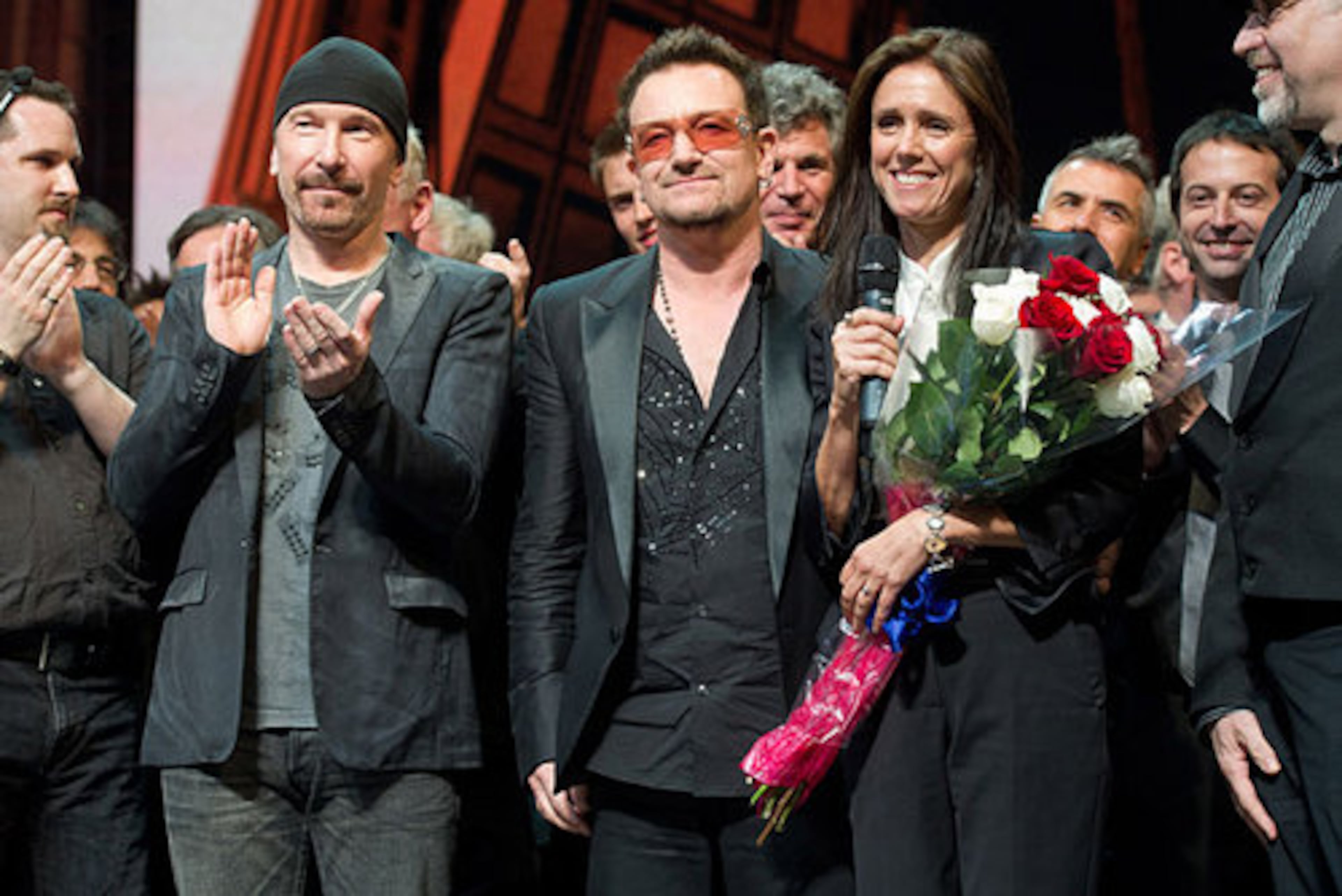 Julie Taymor, right, Bono and The Edge appear onstage at the curtain call for the opening night performance of the Broadway musical "Spider-Man Turn Off the Dark" in New York, Tuesday, June 14, 2011. U2's Bono and the Edge wrote the score for the production.