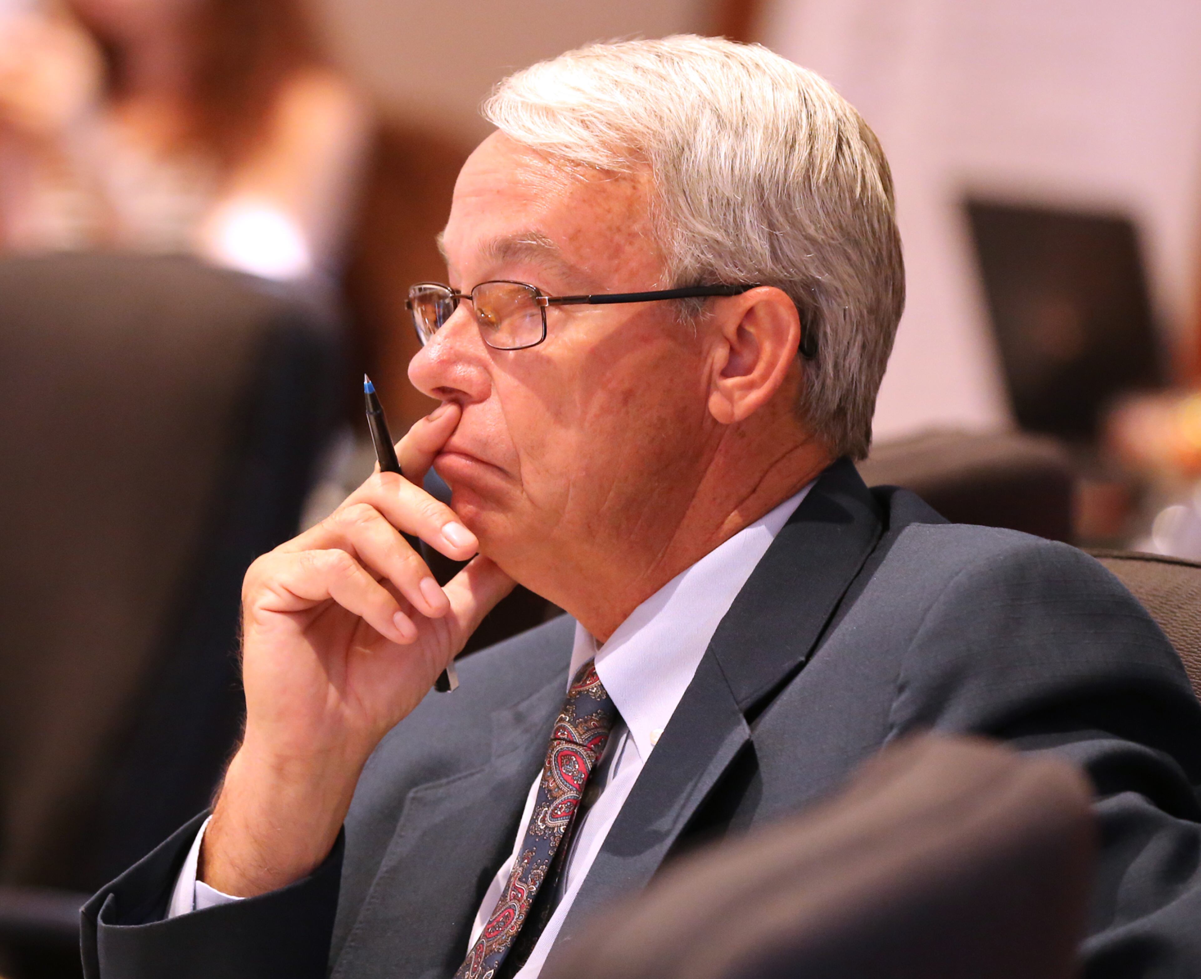 Newton County Commission Chairman Keith Ellis listens while residents speak out in opposition to plans to build a mosque and cemetery in the county on Monday, August 22, 2016, in Covington. Curtis Compton /ccompton@ajc.com
