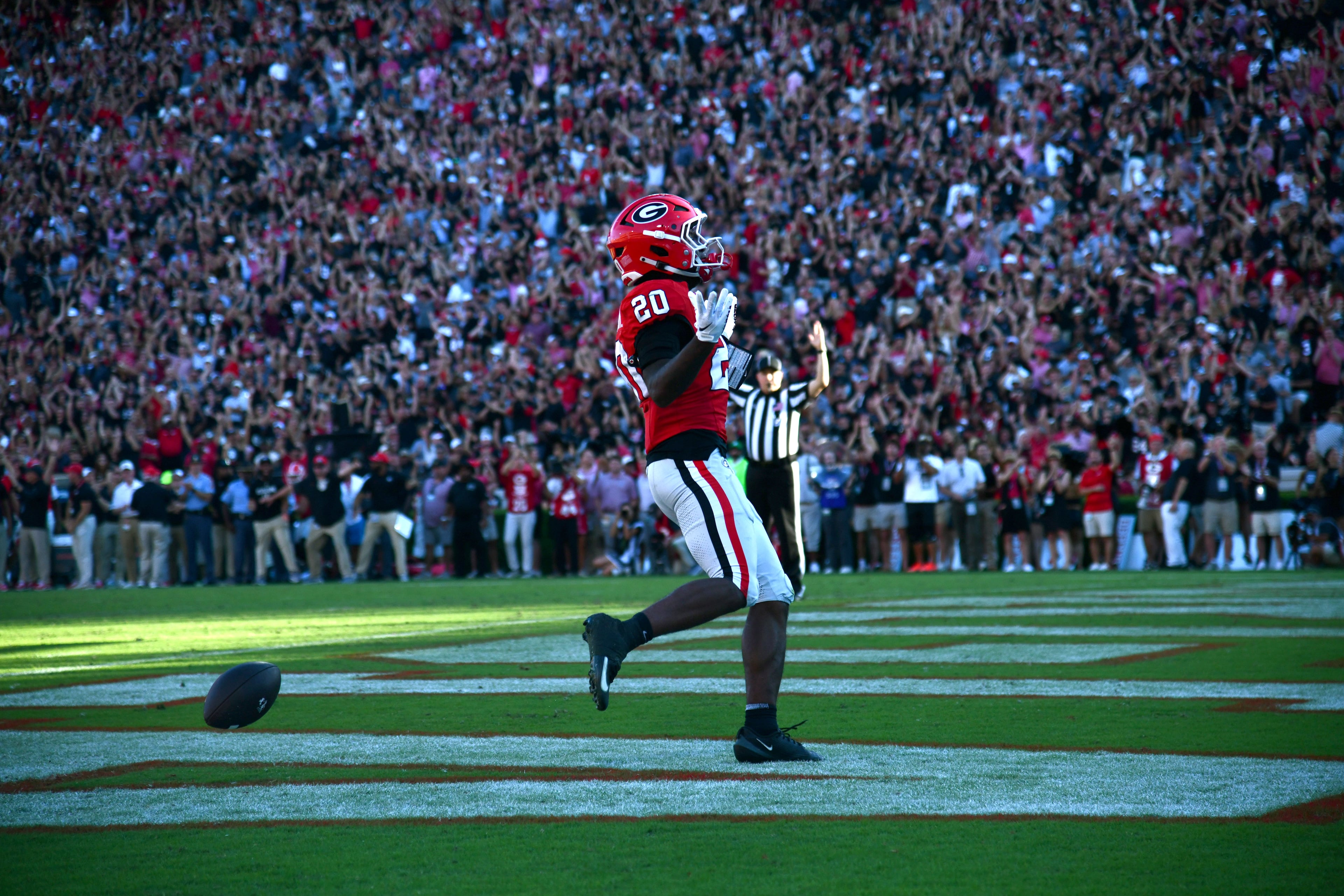 Georgia running back Dwight Phillips Jr. celebrates as he scores a touchdown during the second half of an NCAA football game at Sanford Stadium on Saturday, Sept. 26, 2026, in Athens, Ga. Georgia defeated Oklahoma 41-13. (Hyosub Shin/AJC)