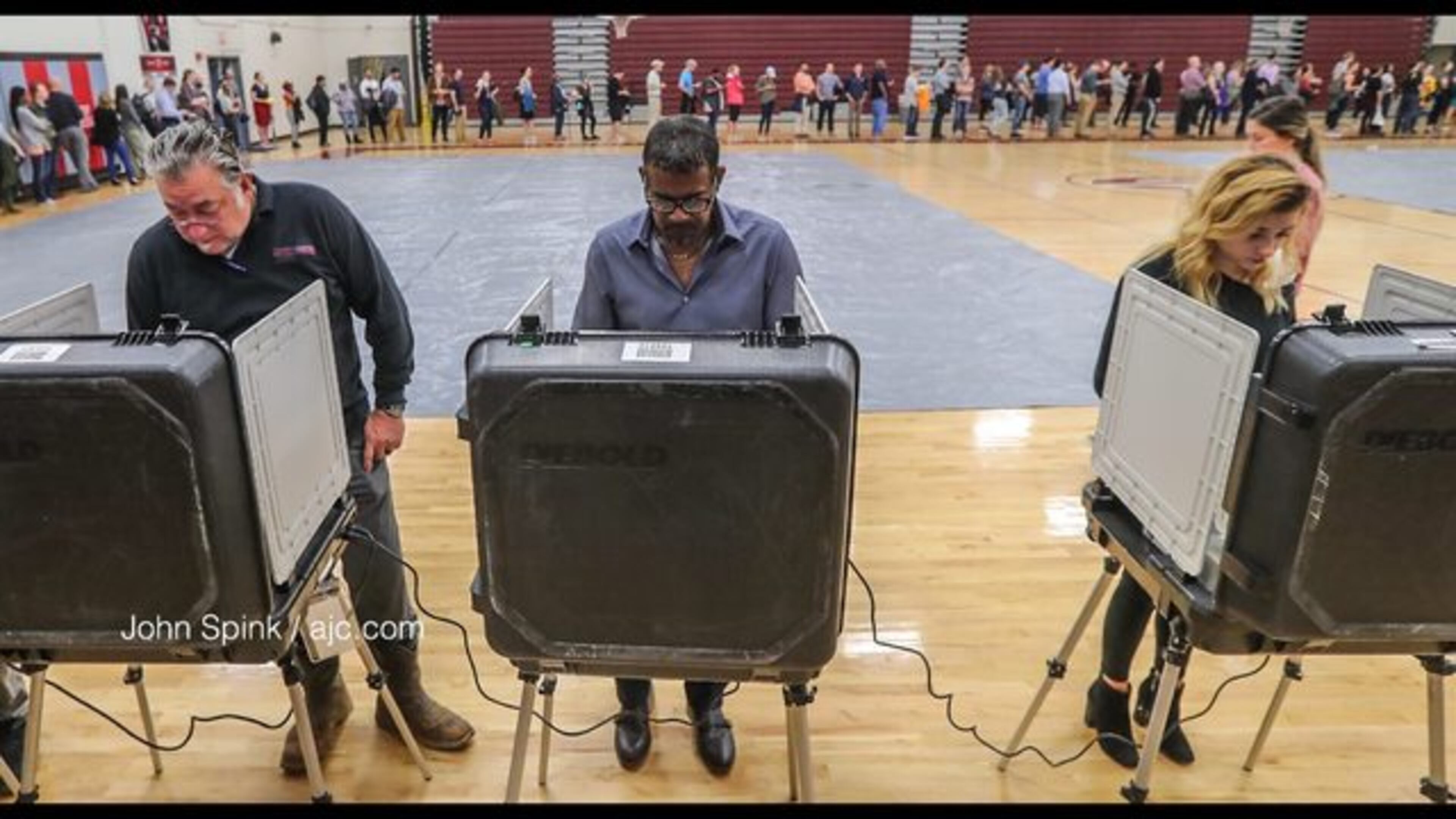 <p>Grady voters stand in a long line Tuesday&nbsp;</p> <p>Voters wait in line at Anniston Elementary in Gwinnett County on Election Day 2018.</p> <p>Voters at Grady</p> <p>Dr. Frank Lockwood was the first in line at Henry W. Grady High School at 29 Charles Allen Dr NE, in Atlanta on Tuesday Nov. 6, 2018. Metro Atlanta polling places reported steady lines as voters went to the polls Tuesday.&nbsp; JOHN SPINK/JSPINK@AJC.COM</p> <p>Voters wait in long lines at Helene S. Mills Senior Multipurpose Facility (BECCA GODWIN/AJC)</p> <p>Voters with umbrellas brave the rain in Smyrna</p> <p>Poll manager Melvin Davis Jr. At Grady</p> <p>Voters waiting in line before polled opened at 7 a.m. Tuesday.</p> <p>Voters at Burgess-Petersen Academy in East Atlanta</p> <p>Voters at Burgess-Petersen Academy in East Atlanta</p> <p>Voters at Burgess-Petersen Academy in East Atlanta</p> <p>Voters early Tuesday morning in east Cobb County</p>