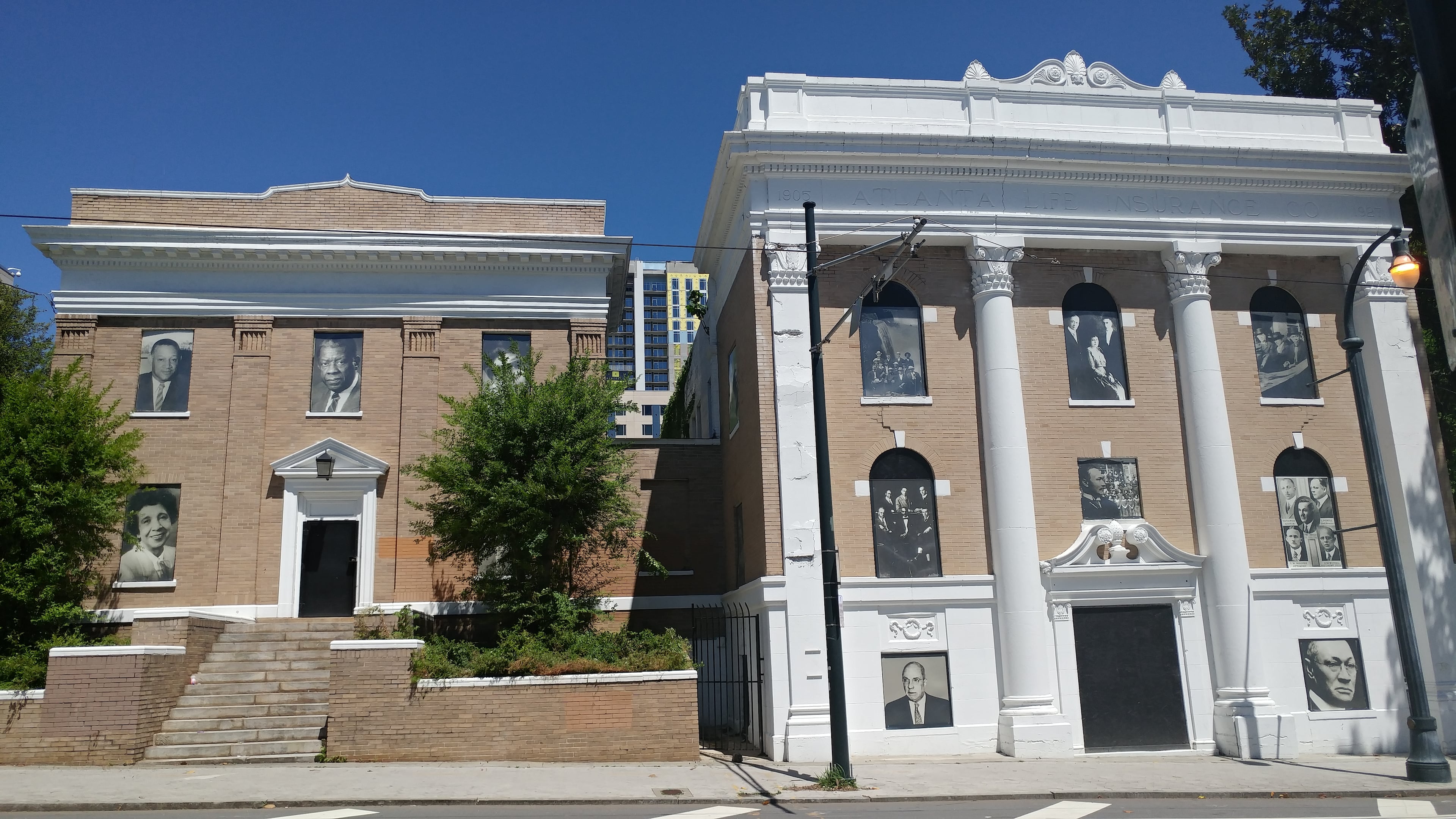 A series of portraits on the former Atlanta Life Insurance Company buildings are providing a peek into the company’s legacy and that of the Atlanta’s historic Sweet Auburn district.