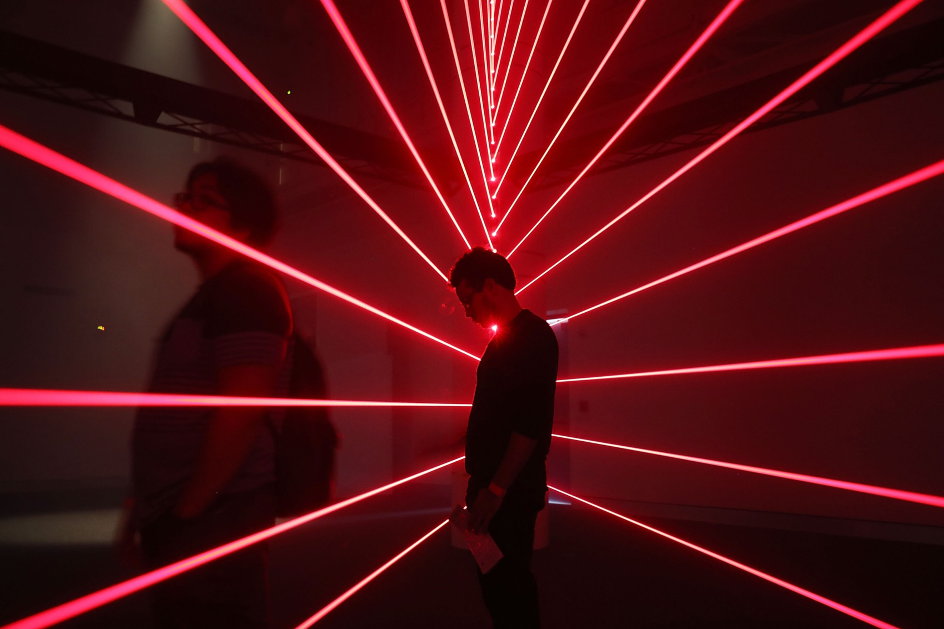 MIAMI, FL - MAY 08: Daniel Pacheco visits the Lasers How exhibit on opening day for the Phillip and Patricia Frost Museum of Science on May 8, 2017 in Miami, Florida. The 250,000 square foot museum sits on four acres and is divided into four buildings: the Aquarium, the Frost Planetarium, and the North and West Wings, where guests get to see exhibits from the ocean to the Everglades, from the human cell to outer space, and the process of science and innovation. (Photo by Joe Raedle/Getty Images) *** BESTPIX ***