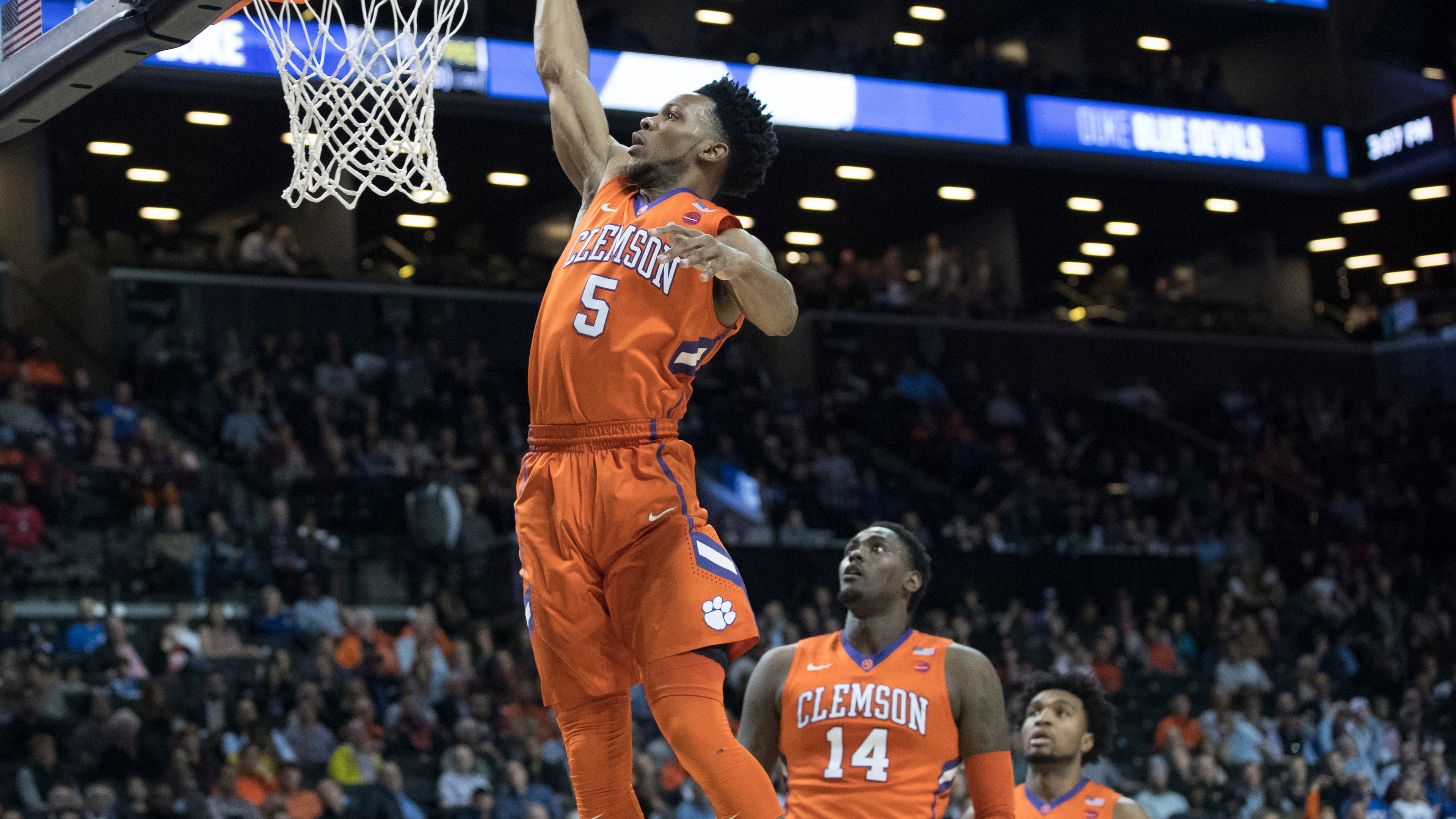 Clemson forward Jaron Blossomgame (5) dunks during the first half of an NCAA college basketball game against Duke in the Atlantic Coast Conference tournament, Wednesday, March 8, 2017, in New York. (AP Photo/Mary Altaffer)