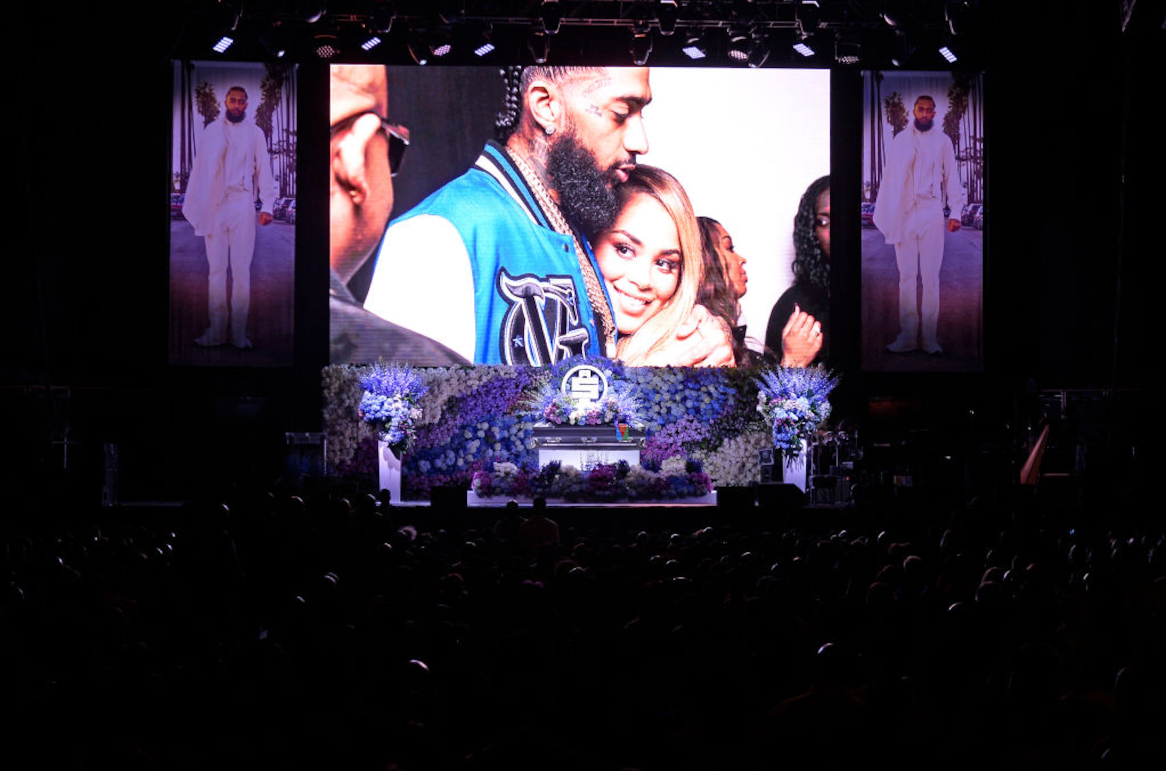 LOS ANGELES, CALIFORNIA - APRIL 11: (EDITORS NOTE: All images taken by Getty Images inside the Staples Center at Nipsey Hussle's Celebration of Life have been reviewed and approved for distribution by Atlantic Records) Photos are displayed during Nipsey Hussle's Celebration of Life at STAPLES Center on April 11, 2019 in Los Angeles, California. Nipsey Hussle was shot and killed in front of his store, The Marathon Clothing, on March 31, 2019 in Los Angeles. (Photo by Kevork Djansezian/Getty Images For Atlantic Records)