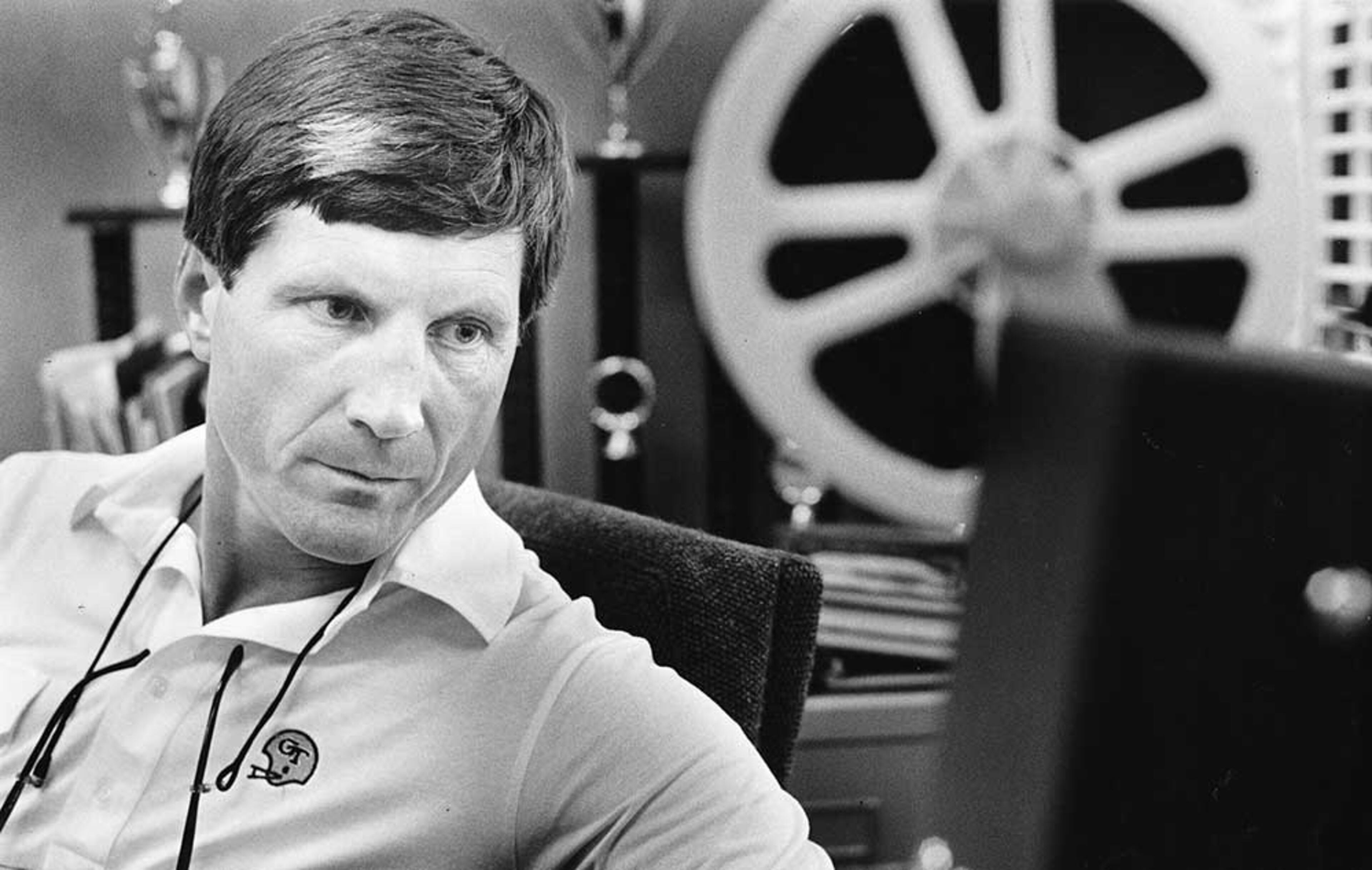 Georgia Tech coach Bill Curry reviews footage of an opponent in 1986. William Berry / AJC