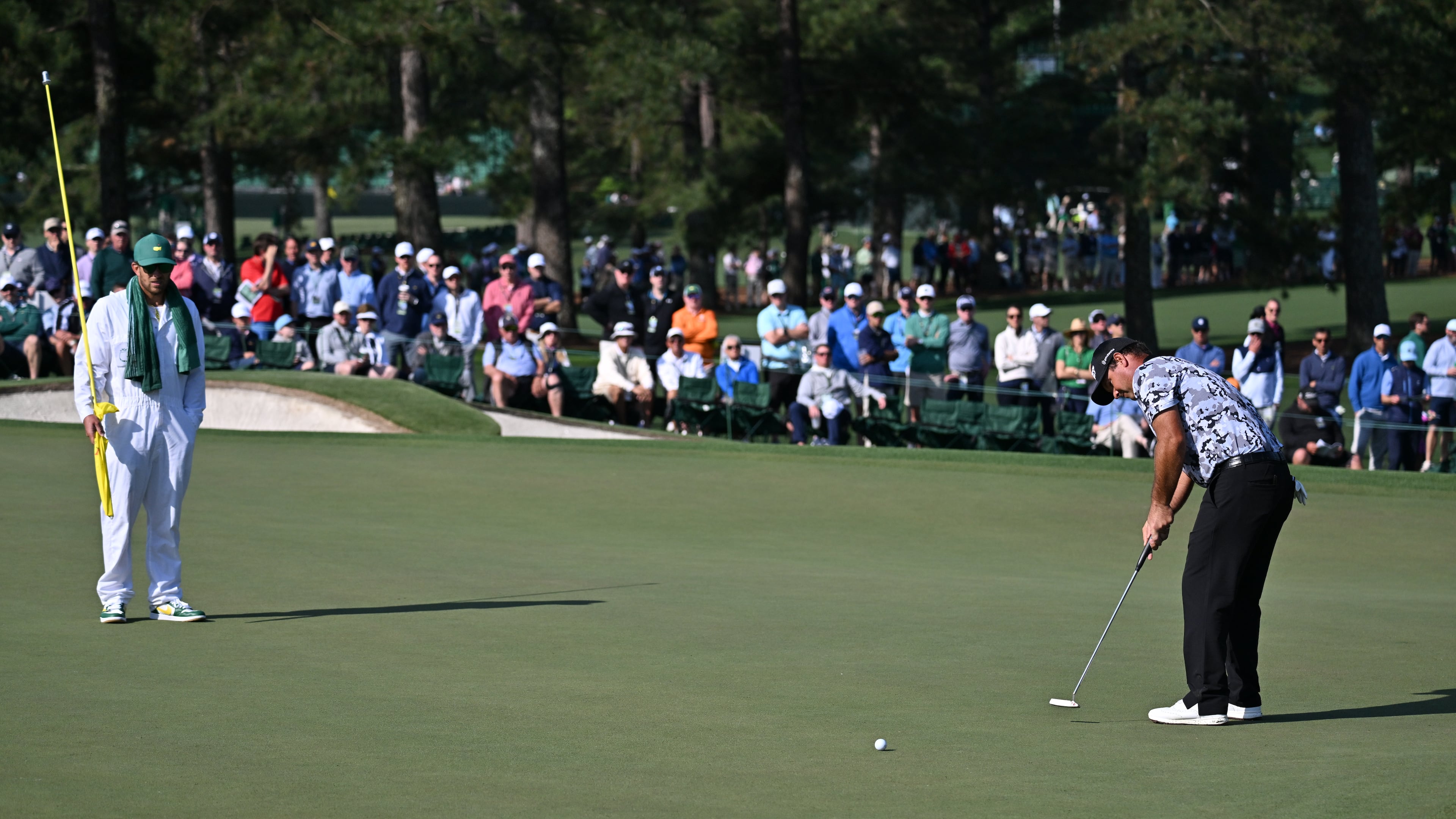 Patrick Reed putts on second green during first round of the Masters golf tournament, at Augusta National Golf Club, Thursday, April 10, 2025, in Augusta, Ga. (Hyosub Shin / AJC)
