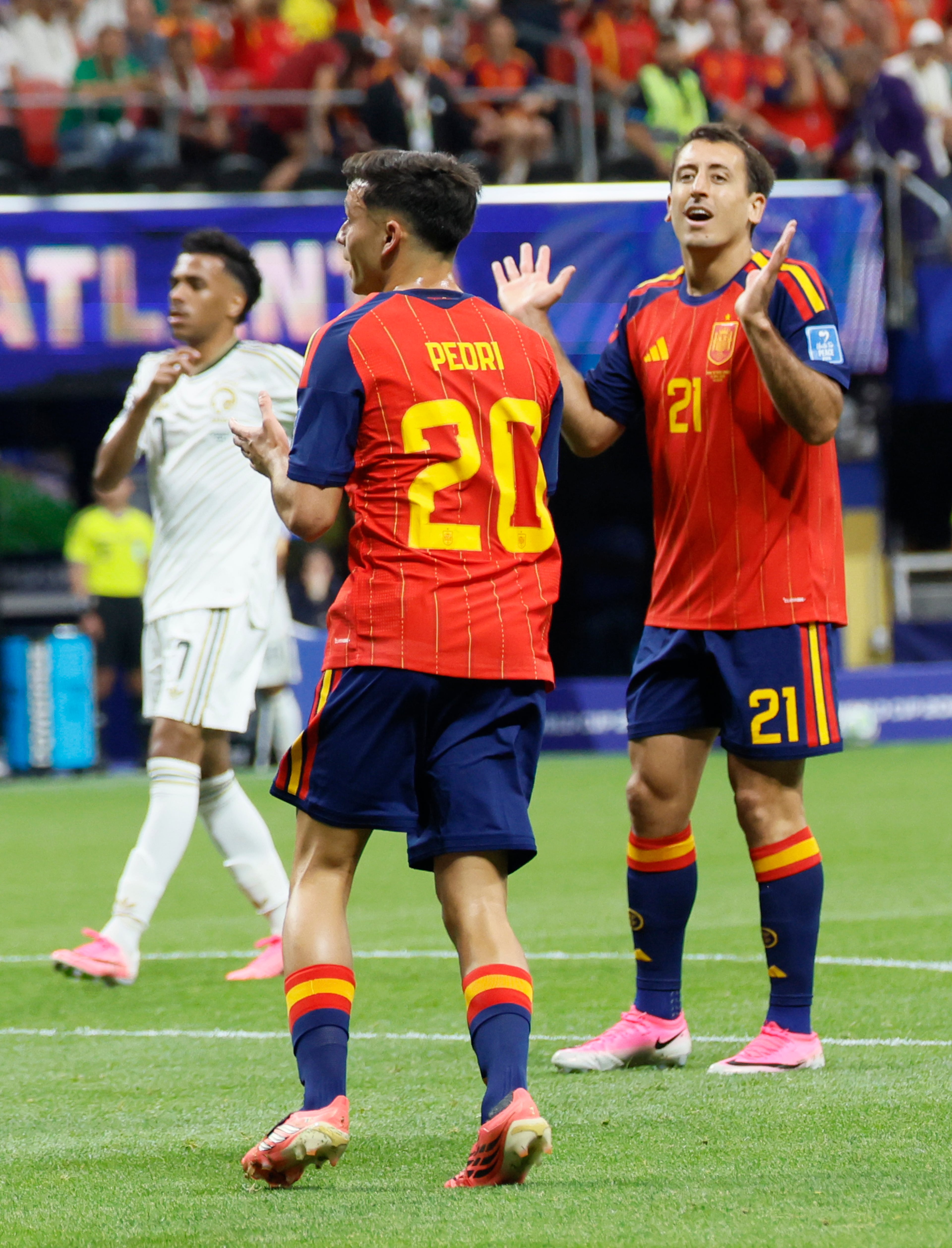 Spain's Pedri (center) and Mikel Oyarzabal (right) react to a missed shot during the first half of the Spain vs. Saudi Arabia World Cup match Sunday, June 21, 2026, at Atlanta Stadium. (Miguel Martinez/AJC)