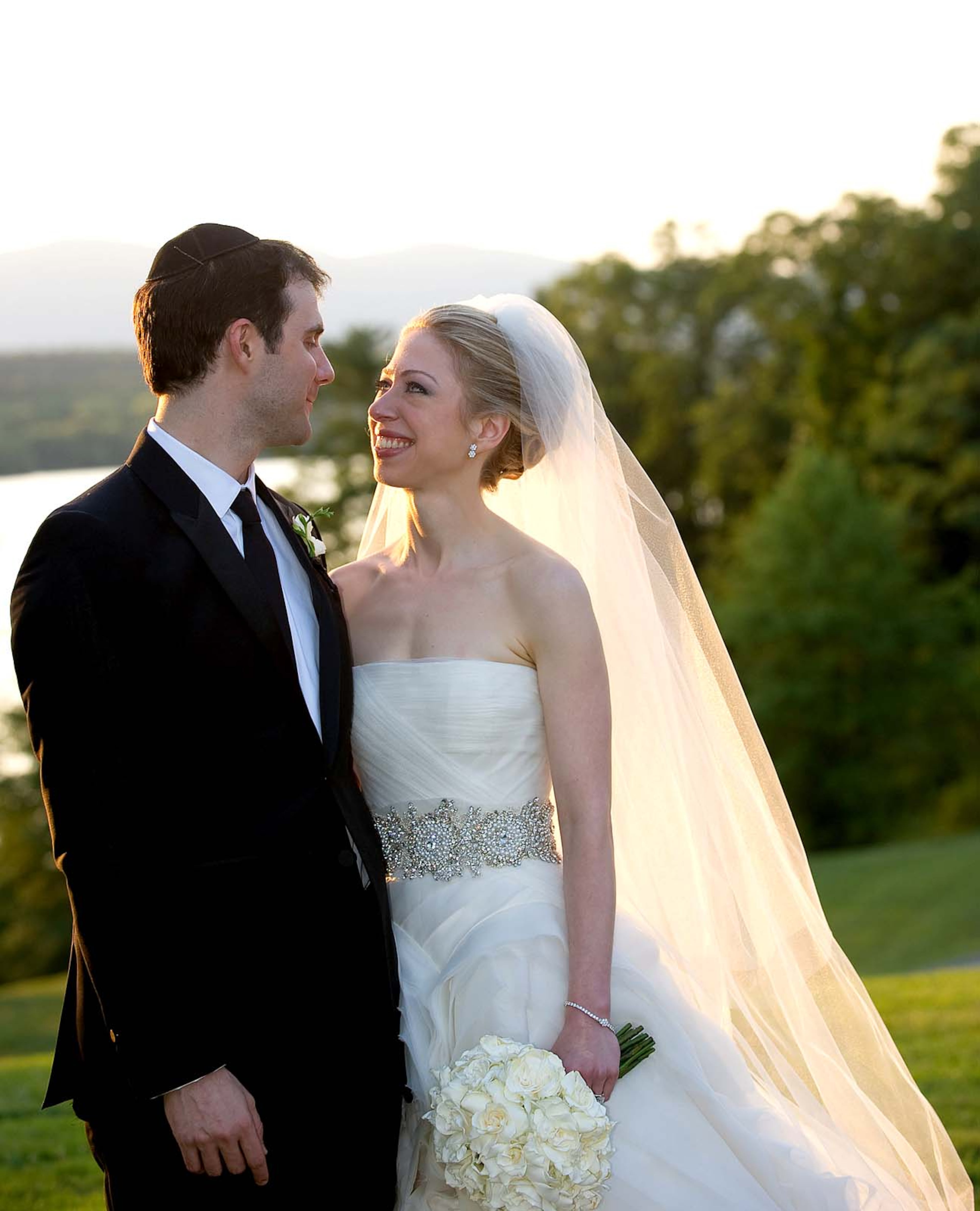 In this photo provided by Genevieve de Manio Photography, Chelsea Clinton and Marc Mezvinsky are seen during their wedding, Saturday, July 31, 2010 in Rhinebeck, N.Y. (Genevieve de Manio/Genevieve de Manio Photography )