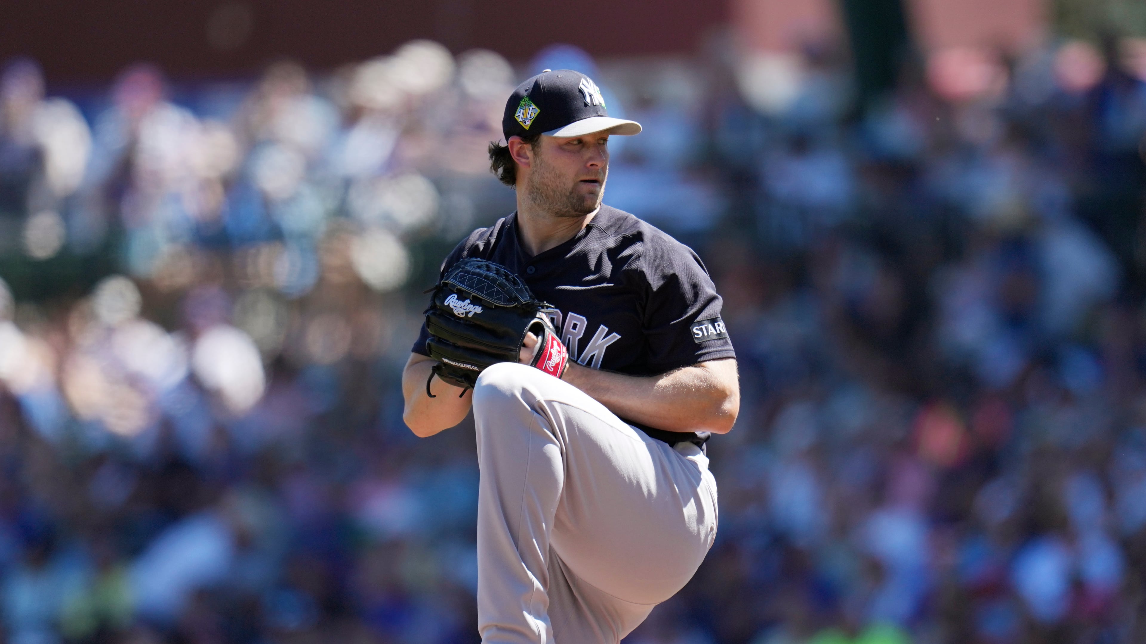 FILE - New York Yankees starting pitcher Gerrit Cole throws against the Chicago Cubs during the first inning of a spring training baseball game, Tuesday, March 24, 2026, in Mesa, Ariz. (AP Photo/Ross D. Franklin, File)