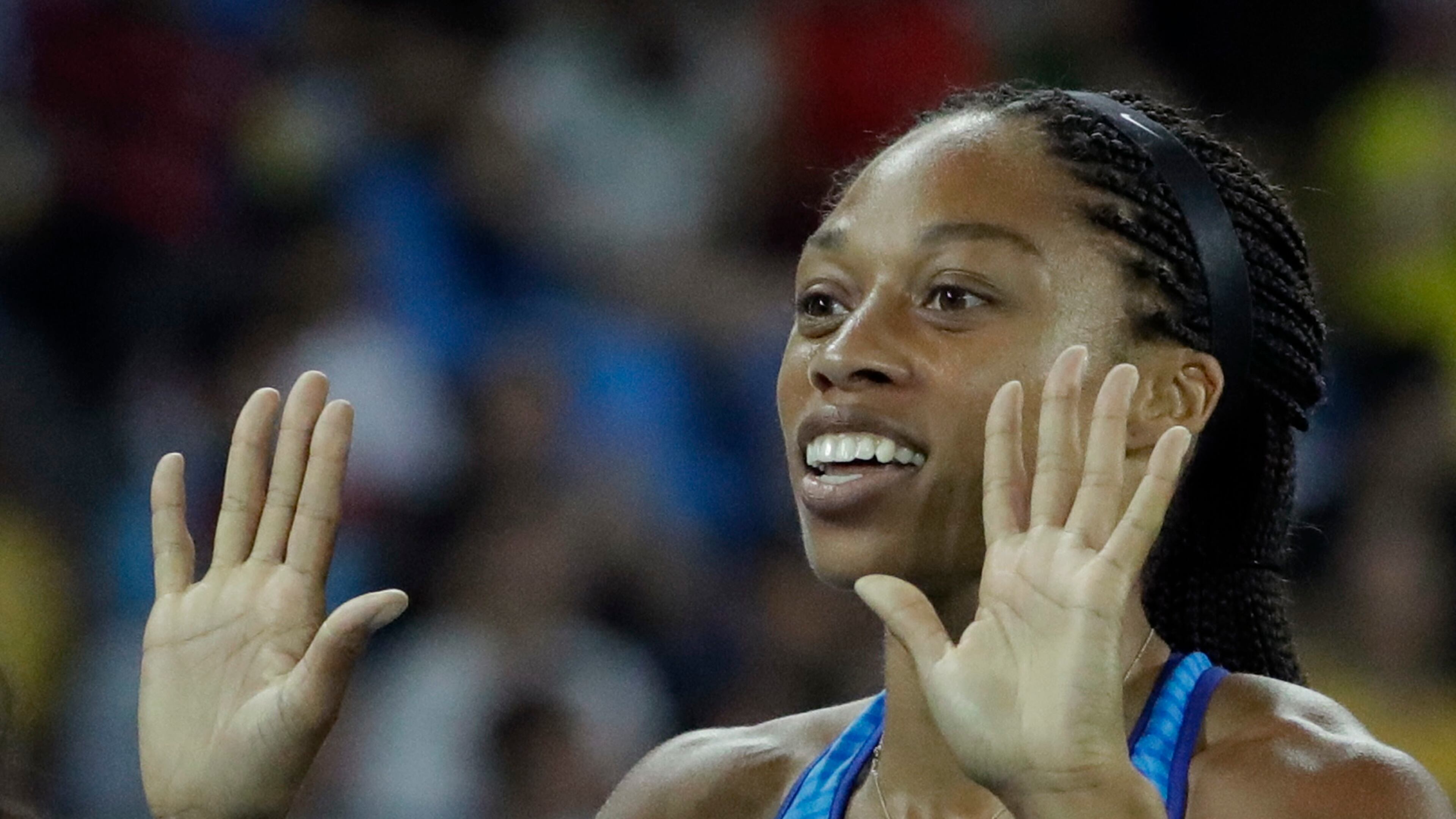 United States' Allyson Felix smiles after winning the gold in the women's 4x100-meter final during the athletics competitions of the 2016 Summer Olympics at the Olympic stadium in Rio de Janeiro, Brazil, Friday, Aug. 19, 2016. (AP Photo/Matt Dunham)