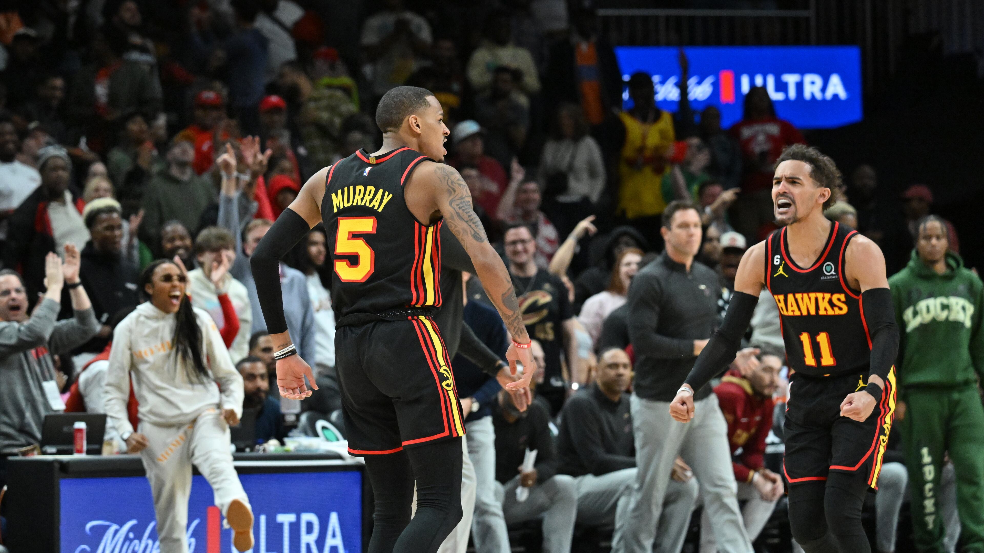 Atlanta Hawks' guard Dejounte Murray (5) celebrates after scoring during the 4th quarter in an NBA basketball game at State Farm Arena, Tuesday, March 28, 2023, in Atlanta. Atlanta Hawks won 120-118 over Cleveland Cavaliers. (Hyosub Shin / Hyosub.Shin@ajc.com)