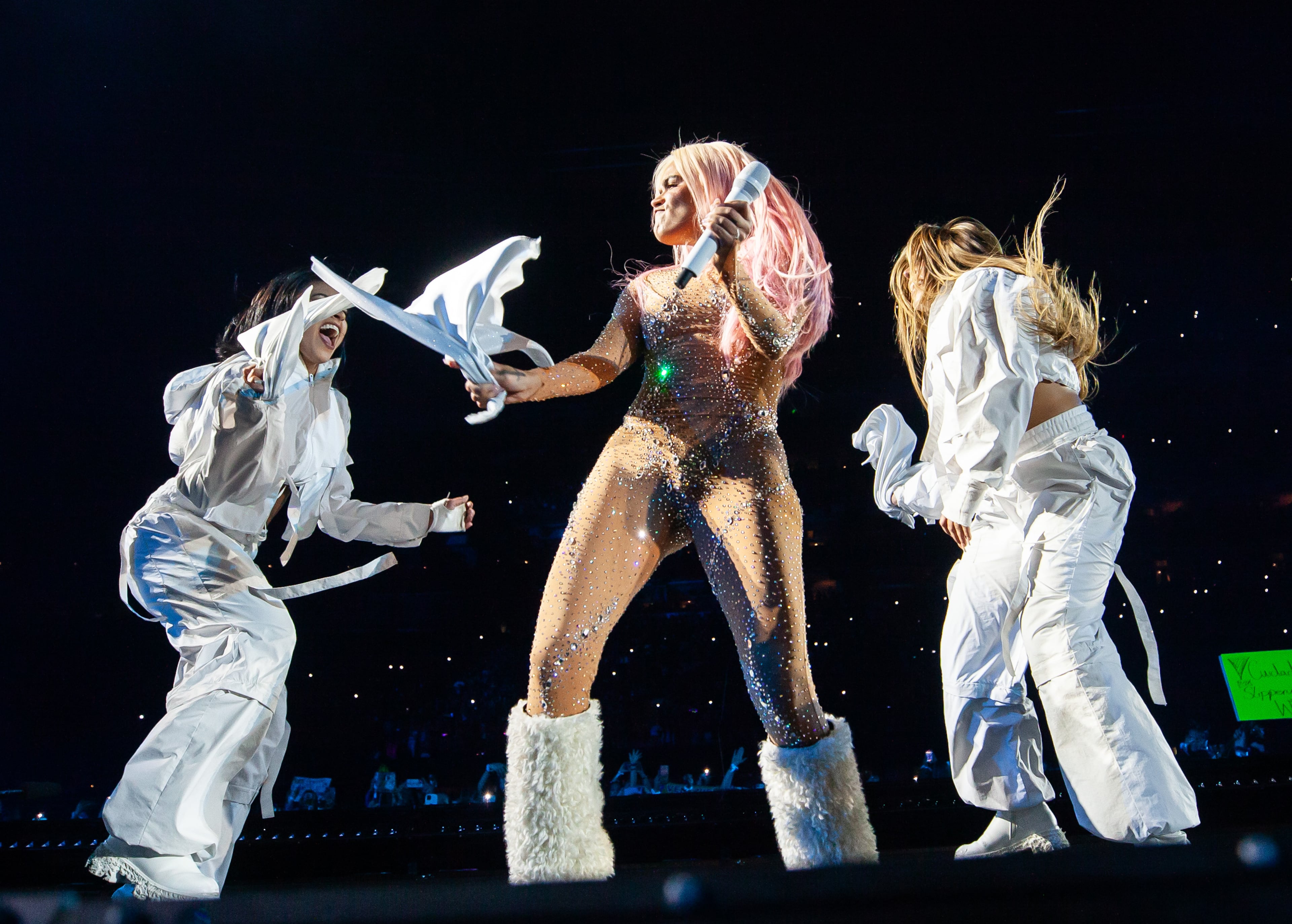 Karol G brought a stunning performance to Mercedes-Benz Stadium on Thursday, Sept. 21, 2023,where the throng of fans showed up in their best Karol G-inspired outfits. (Ryan Fleisher FOR THE ATLANTA JOURNAL-CONSTITUTION)