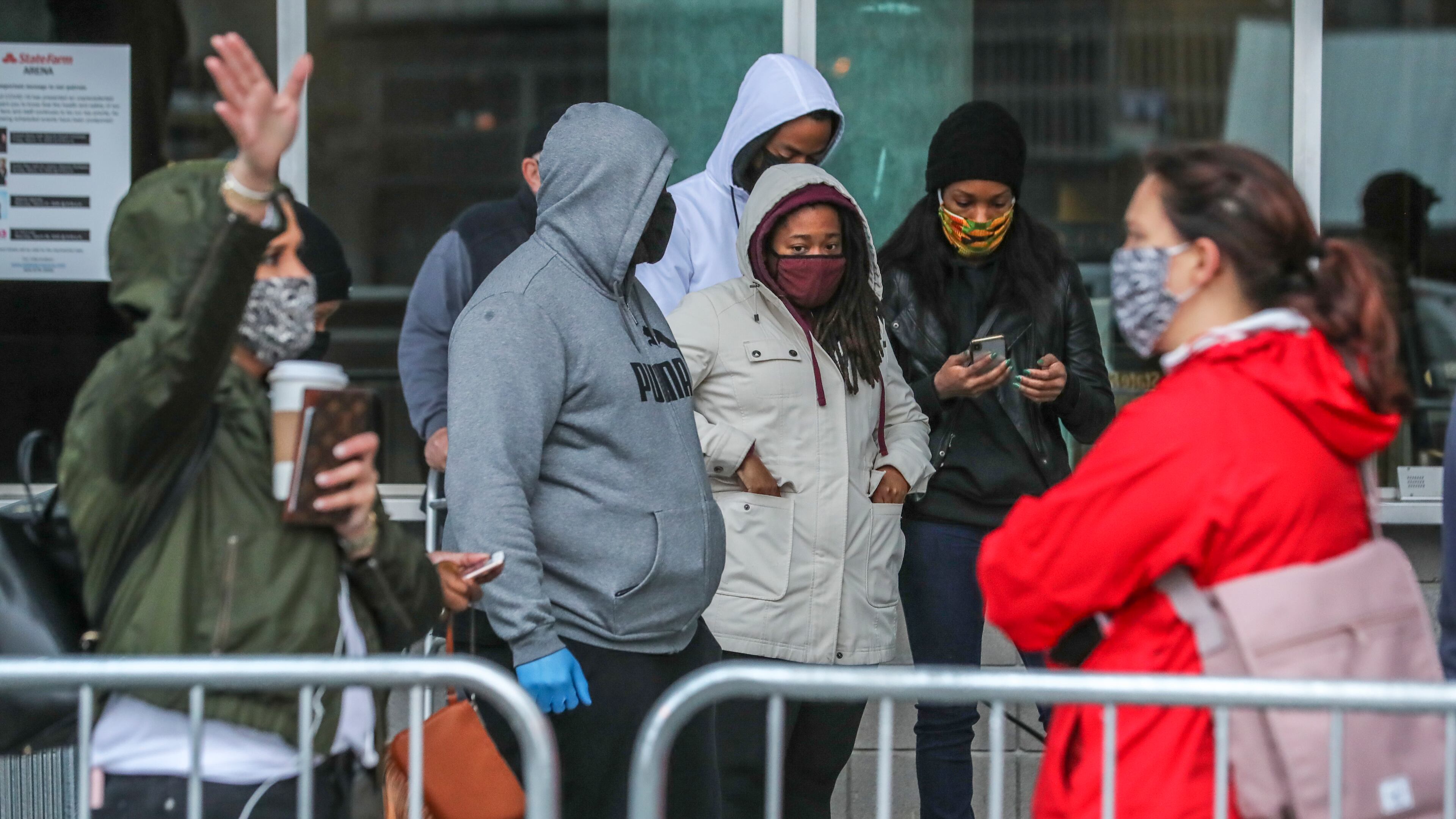 December 14, 2020 Atlanta: Voters came to State Farm Arena on Monday, Dec. 14, 2020 to cast their votes to determine which political party controls the U.S. Senate on the first day of early voting. (John Spink / John.Spink@ajc.com)