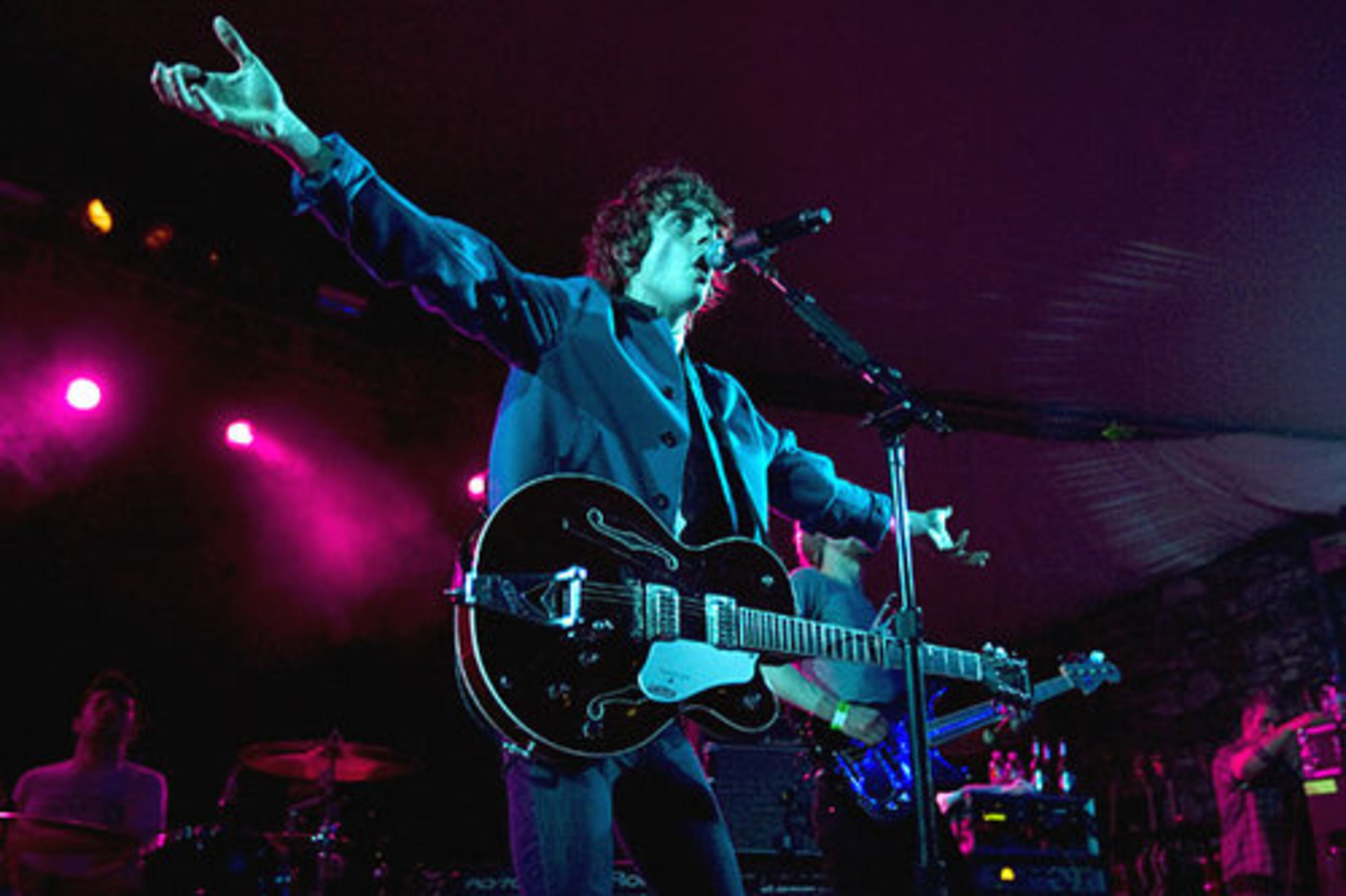 Razorlight lead singer Johnny Borrell plays to the crowd at Stubb's during SXSW.