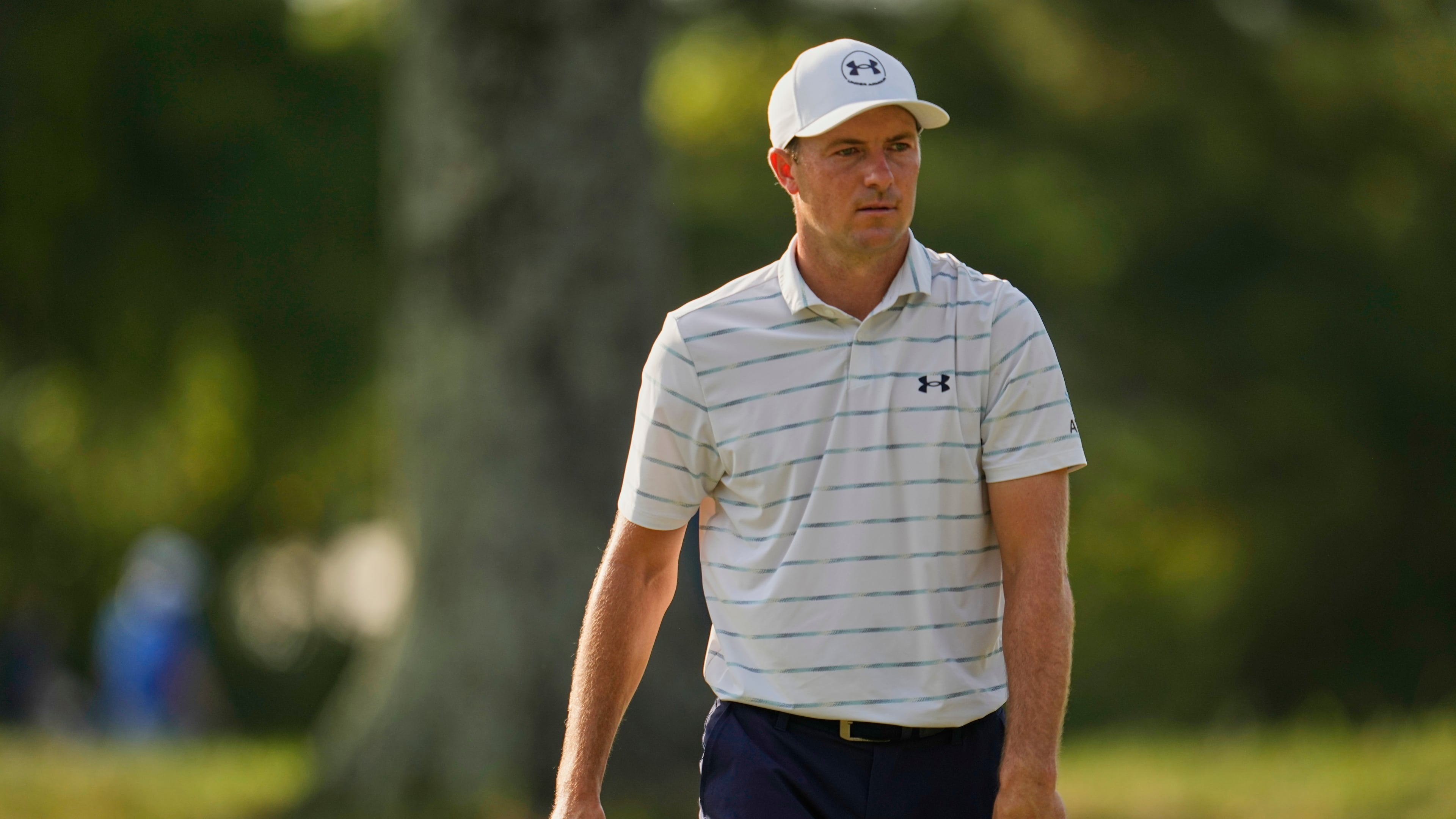 Jordan Spieth walks across the first green during the first round of the St. Jude Championship golf tournament Thursday, Aug. 13, 2026, in Memphis, Tenn. (AP Photo/George Walker IV)