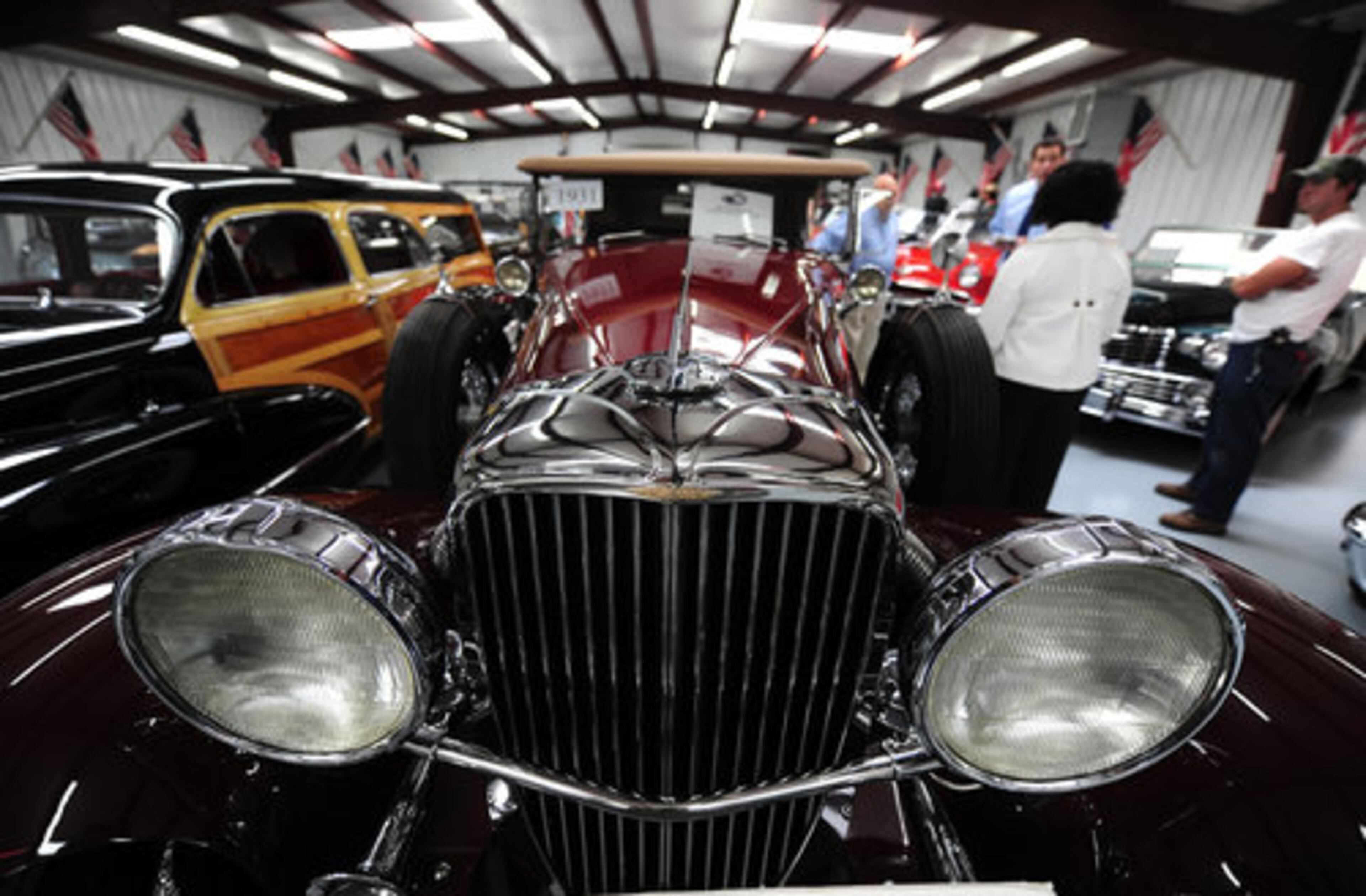 BUT MOST OF the cars are stored at Cathy's Hampton home, like this 1931 Duesenberg. Others include ...