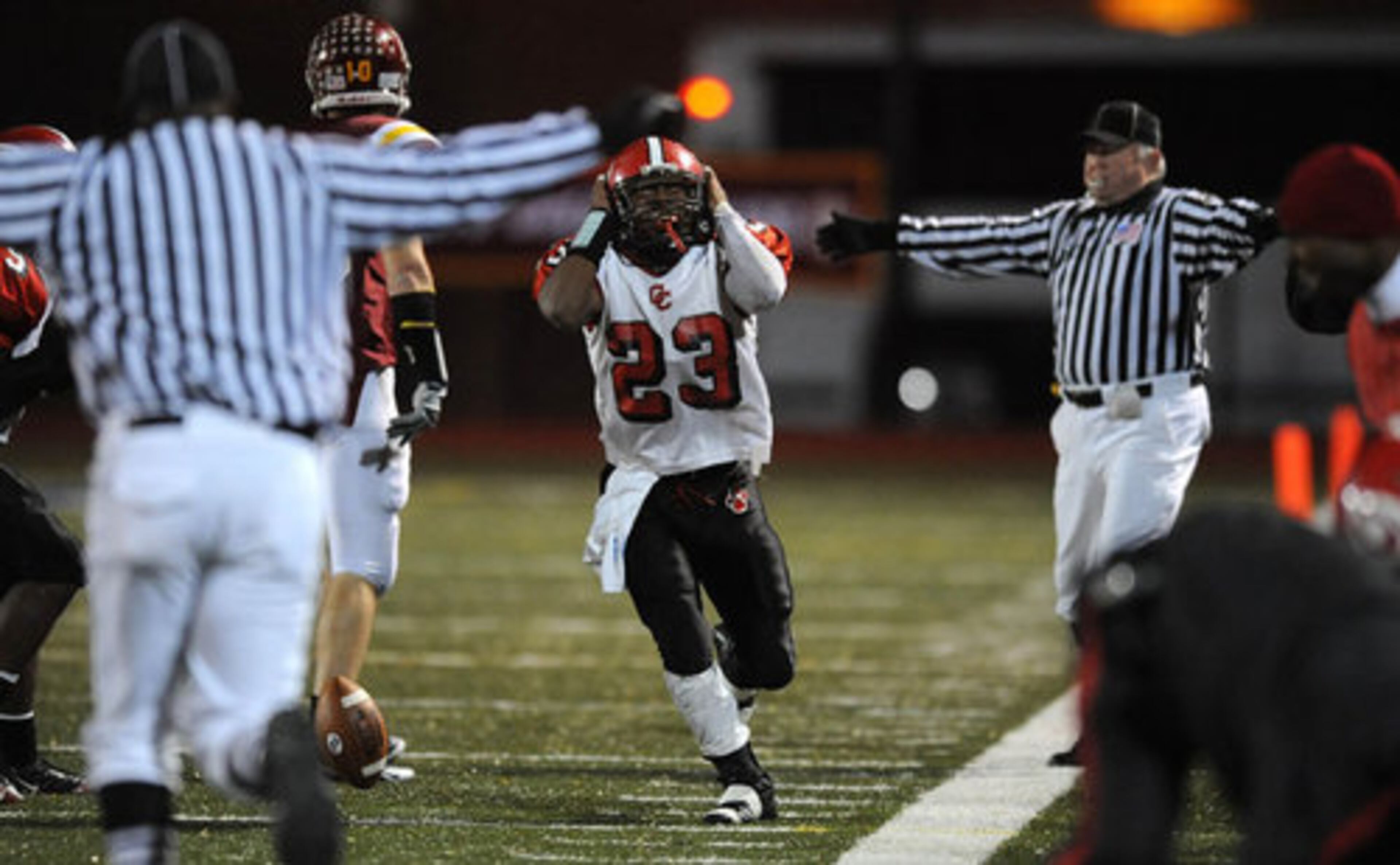 Clinch County's Trey Dorsey (23) runs off disappointed after failing to bring down an interception.