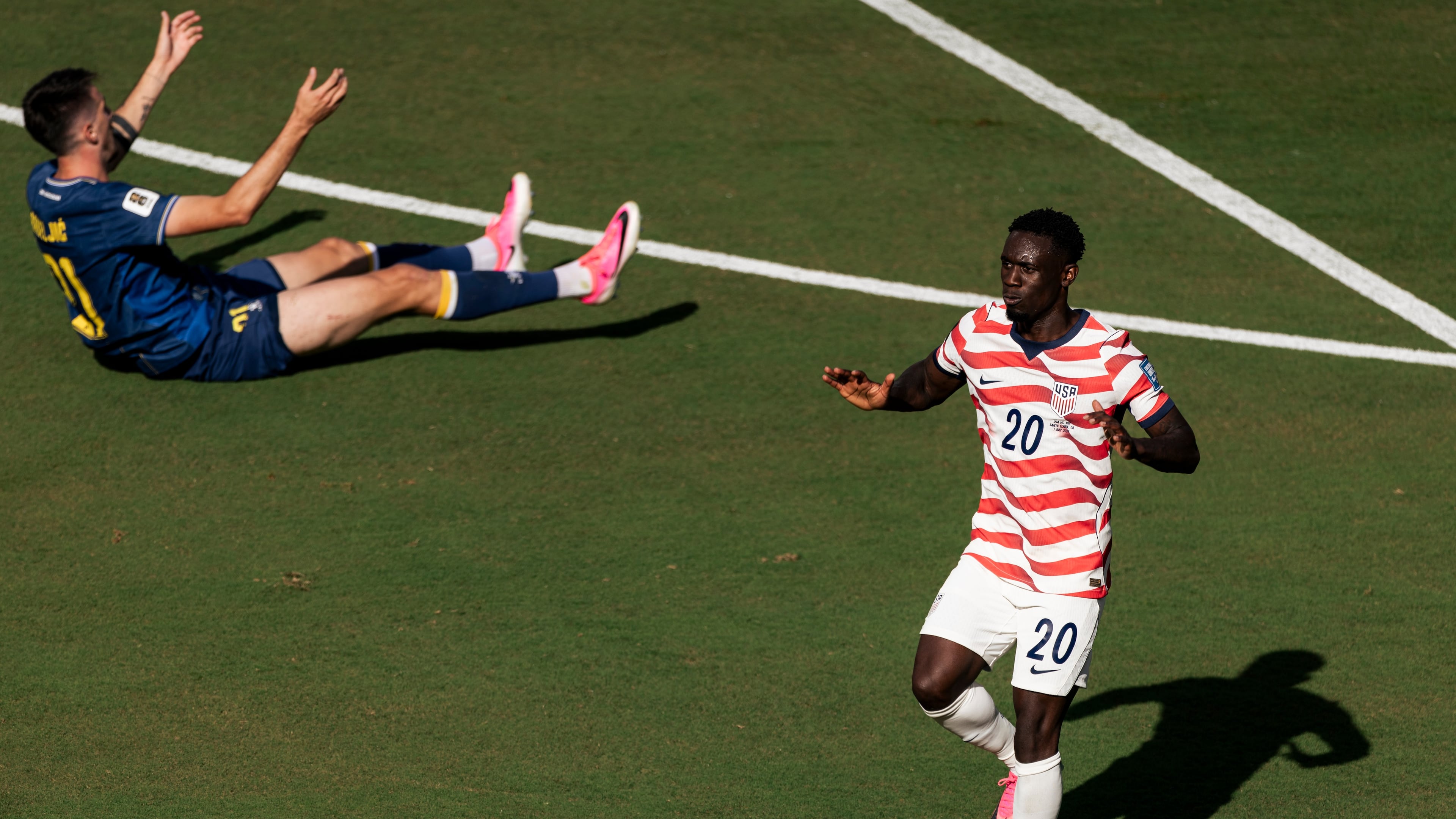 United States forward Folarin Balogun (20) gestures after scoring a goal during the first half of the World Cup 2026 Round of 32 Football match between United States and Bosnia and Herzegovina in Santa Clara, Calif., Wednesday, July 1, 2026. (Stephen Lam/San Francisco Chronicle via AP)