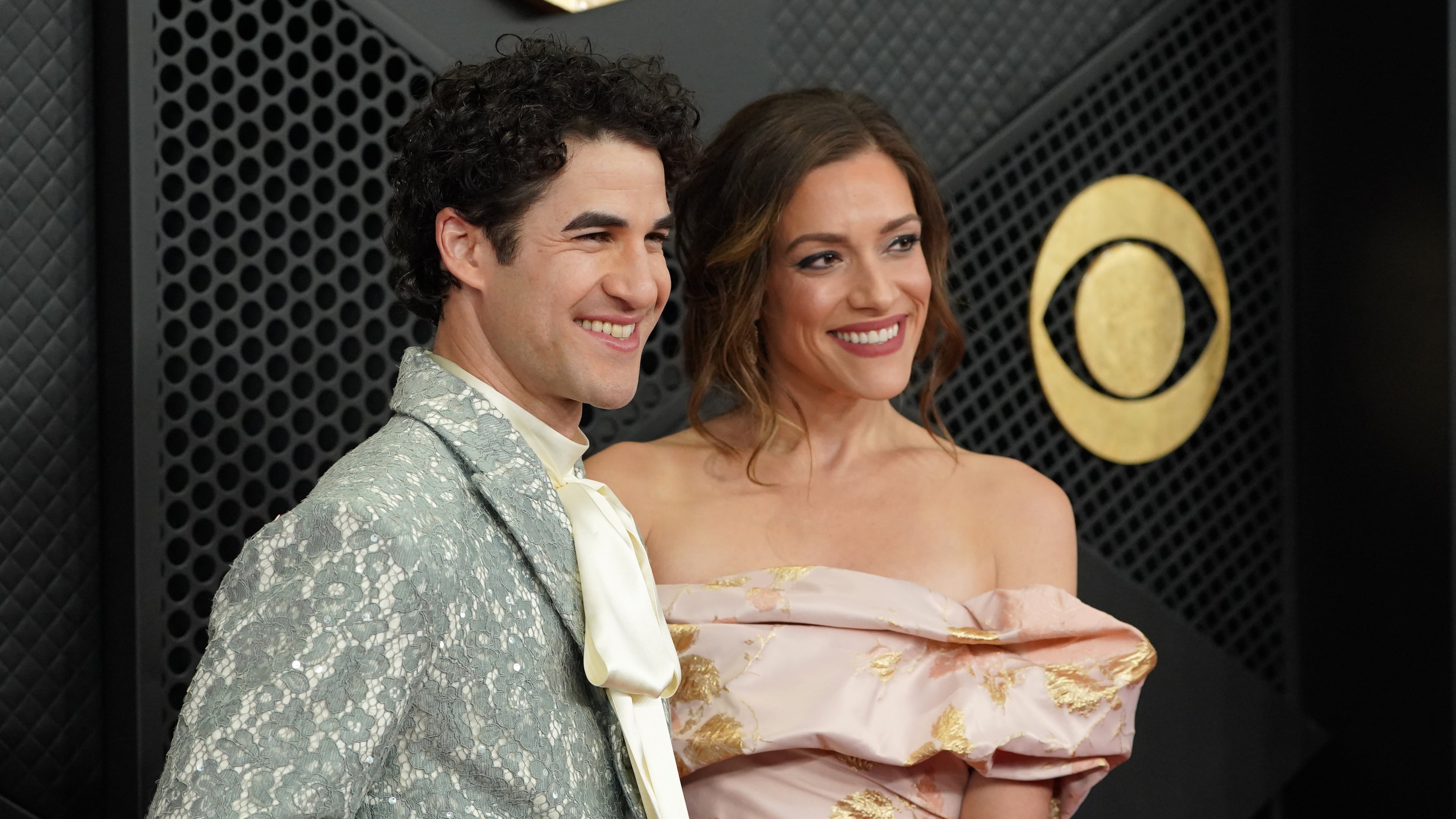 Darren Criss, left, and Mia Swier arrive at the 68th annual Grammy Awards on Sunday, Feb. 1, 2026, in Los Angeles. (Photo by Jordan Strauss/Invision/AP)