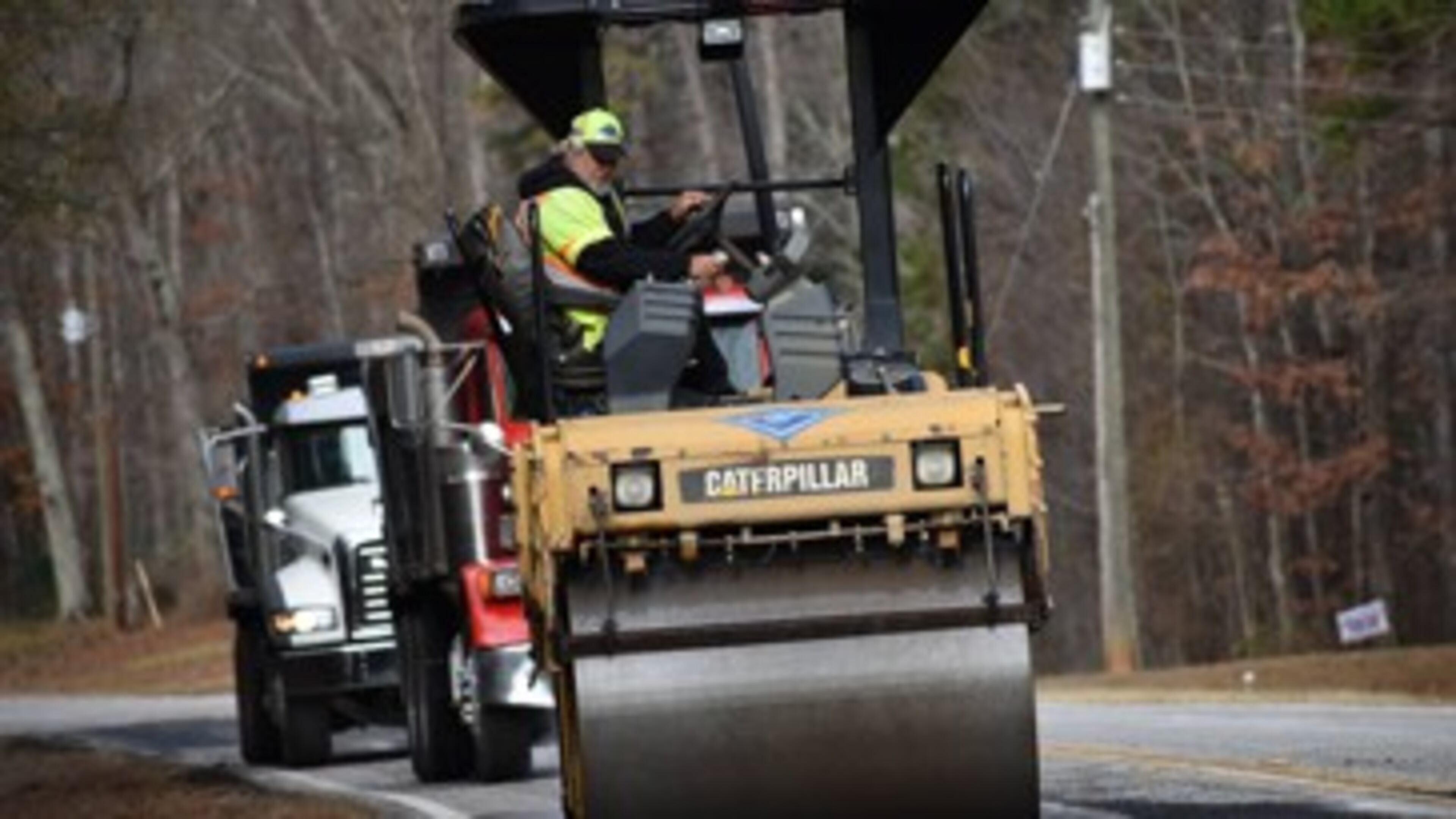 Repaving heavily traveled Sandy Creek Road in Fayette County will require an extra layer of asphalt. AJC file photo