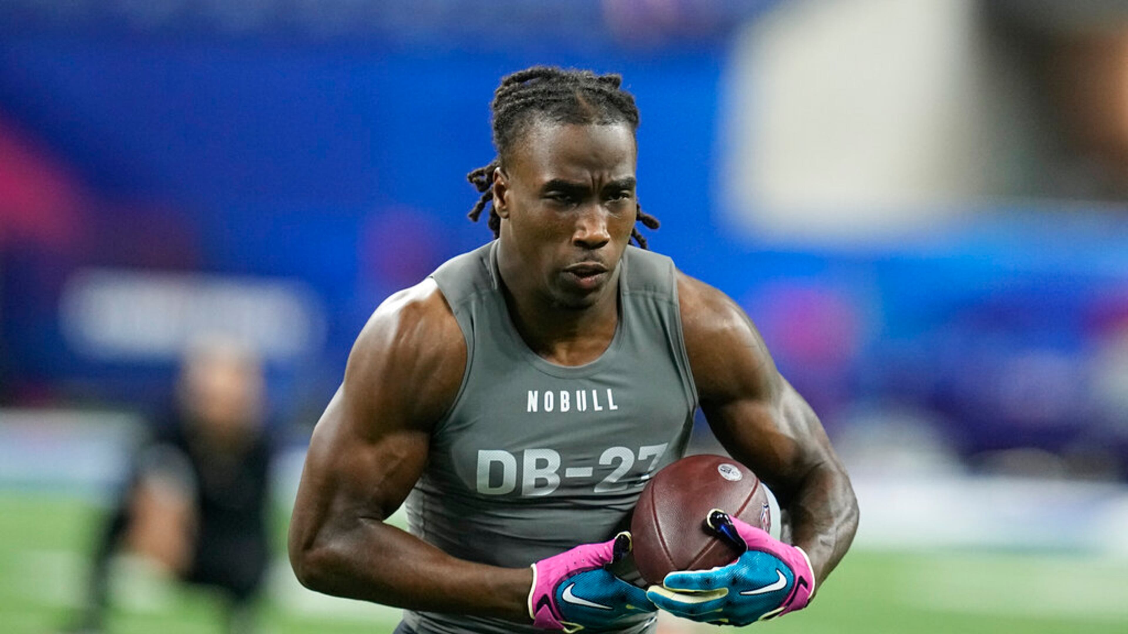 Georgia defensive back Kelee Ringo runs a drill at the NFL football scouting combine in Indianapolis, Friday, March 3, 2023. (AP Photo/Darron Cummings)