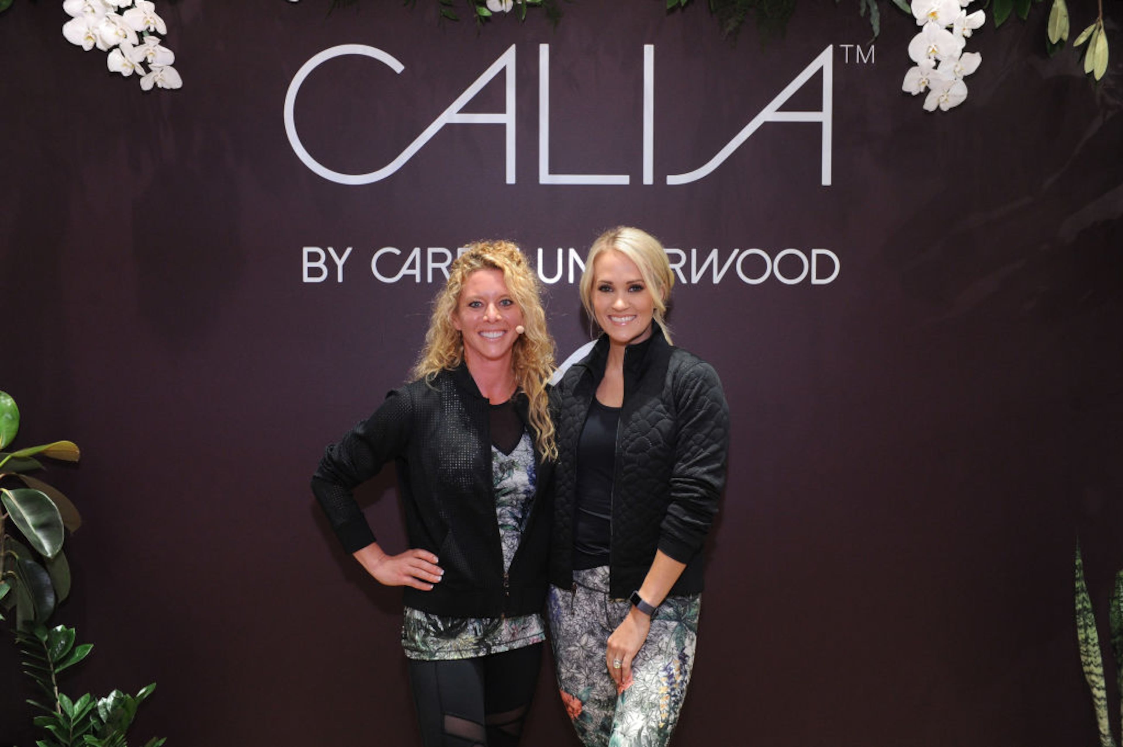 NEW YORK, NY - SEPTEMBER 11: CALIA lead designer, Carrie Underwood and her road trainer, Eve Overland lead a group workout to celebrate the lines Fall/Winter 17 collection at West Edge on September 11, 2017 in New York City. (Photo by Craig Barritt/Getty Images for Calia)