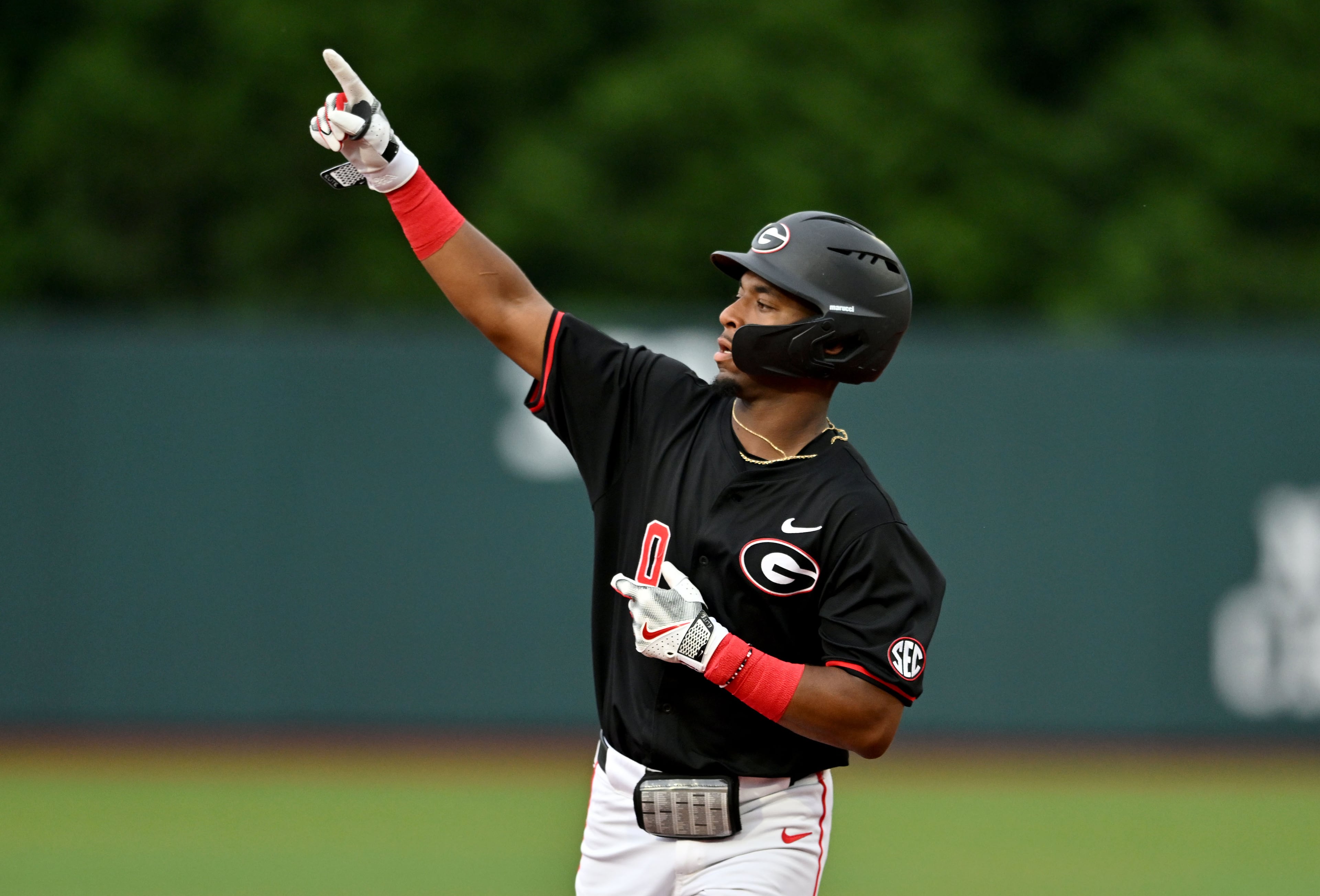 Georgia infielder Ryan Wynn (0) celebrates as he circles the bases on a 2-run home run during the fourth inning of their NCAA Regional game at Foley Field, Friday, May 29, 2026, in Athens. (Hyosub Shin/AJC)
