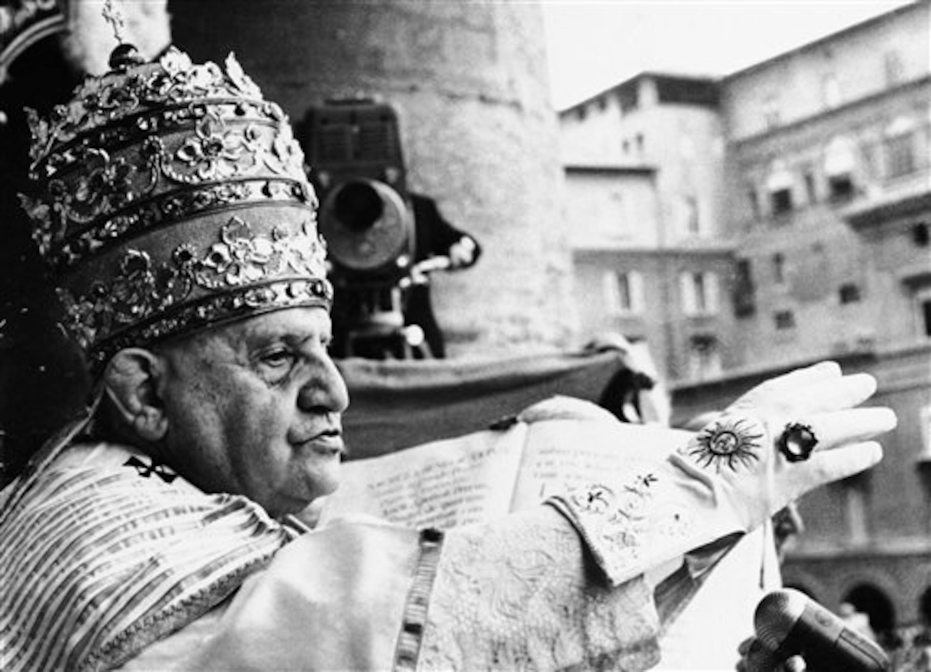 FILE -- In this photo taken on Nov. 4 1958, Pope John XXIII, just after being crowned pontiff of the Roman Catholic Church, raises his hand in blessing at the Vatican, Nov. 4, 1958. John XXIII will be made saint together with late Pope John Paul II during a solemn ceremony at the Vatican Sunday. (AP Photo)
