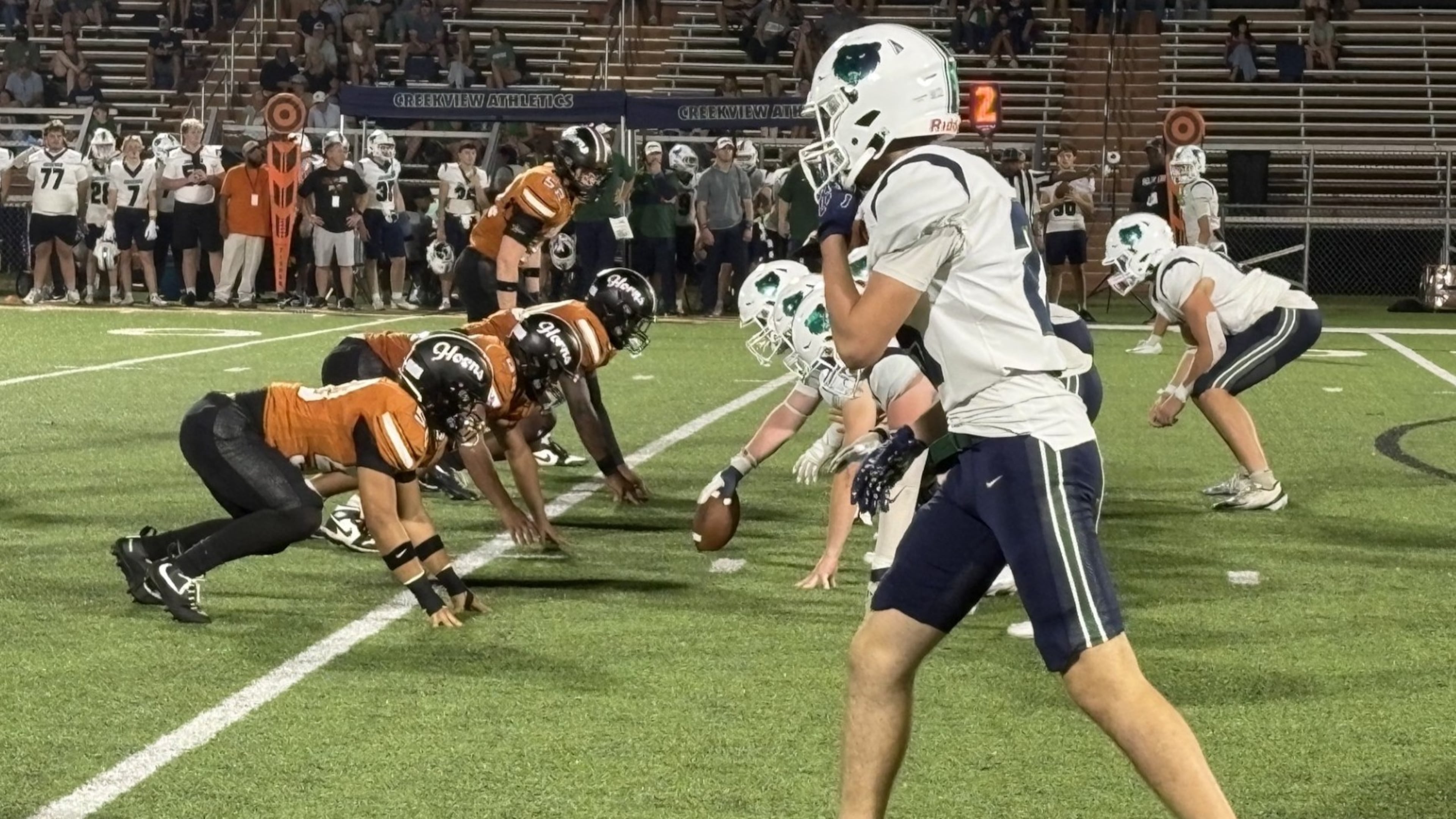 Kell's defense digs in for a play in the fourth quarter of the Longhorns' 41-21 victory over Creekview on Sept. 18, 2026, in Marietta.