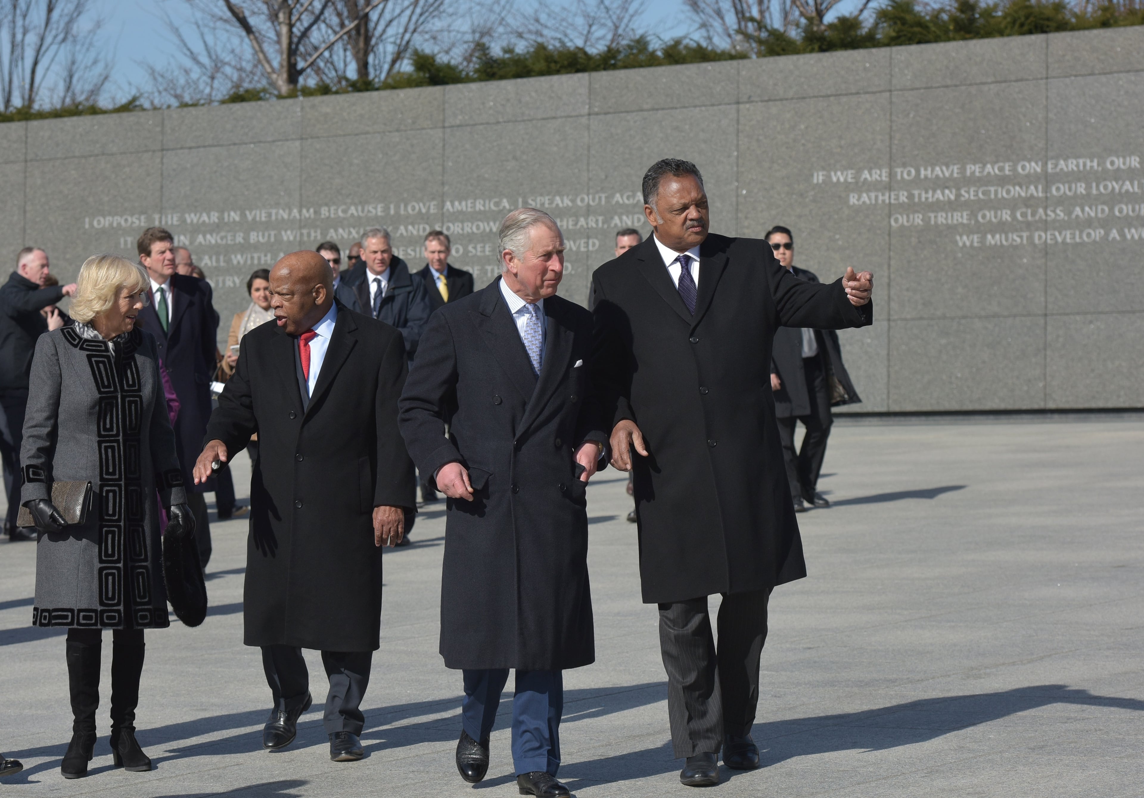 Britain's Prince Charles talks with civil rights leader Rev. Jesse Jackson while his wife Camilla, the Duchess of Cornwall chats with Rep. John Lewis, D-Ga., during a visit to the Martin Luther King Memorial Jr Memorial in Washington, Wednesday, March 18, 2015. (AP Photo/Mandel Ngan, Pool)