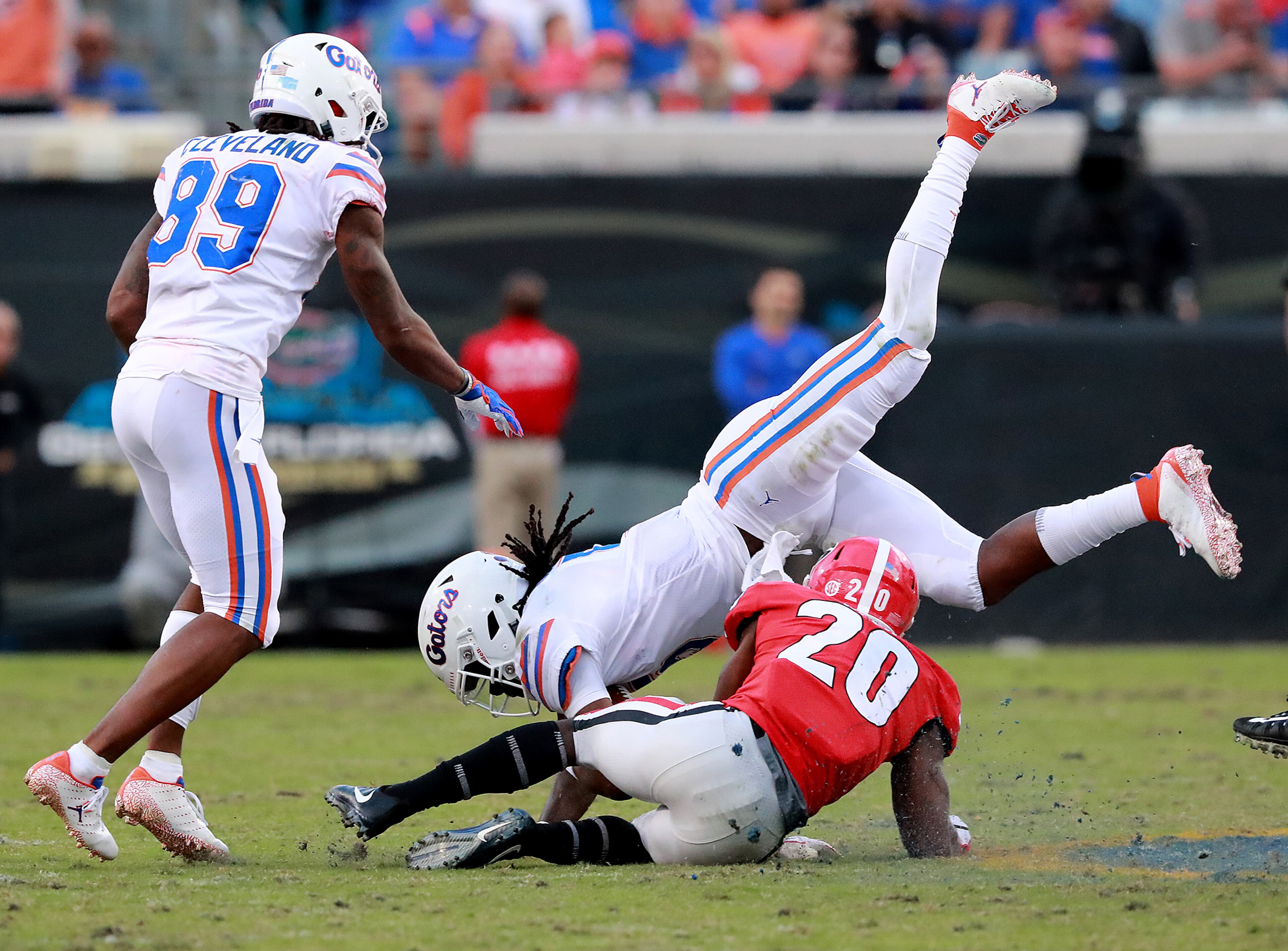 October 27, 2018 Jacksonville: Georgia defensive back J.R. Reed upends Florida quarterback Emory Jones on a quarterback keeper during the second half in the Georgia-Florida NCAA college football game on Saturday, Oct 27, 2018, in Jacksonville. Curtis Compton/ccompton@ajc.com