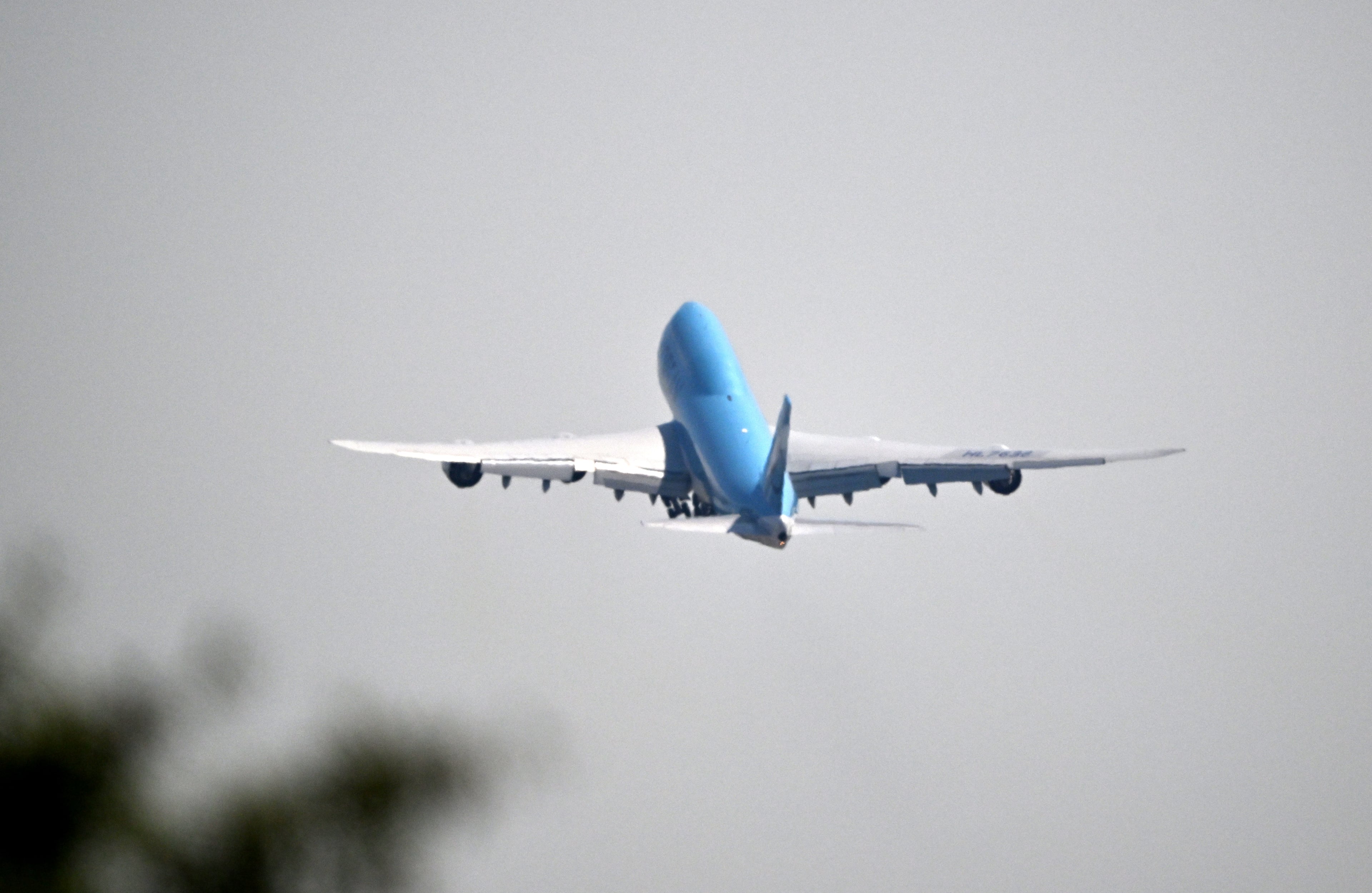 A Korean Air plane takes off from Hartsfield-Jackson Atlanta International Airport on Thursday, Sept. 11, 2025, carrying workers who were detained in a raid at a battery plant on the Hyundai Metaplant campus near Savannah last week. (Hyosub Shin/AJC)