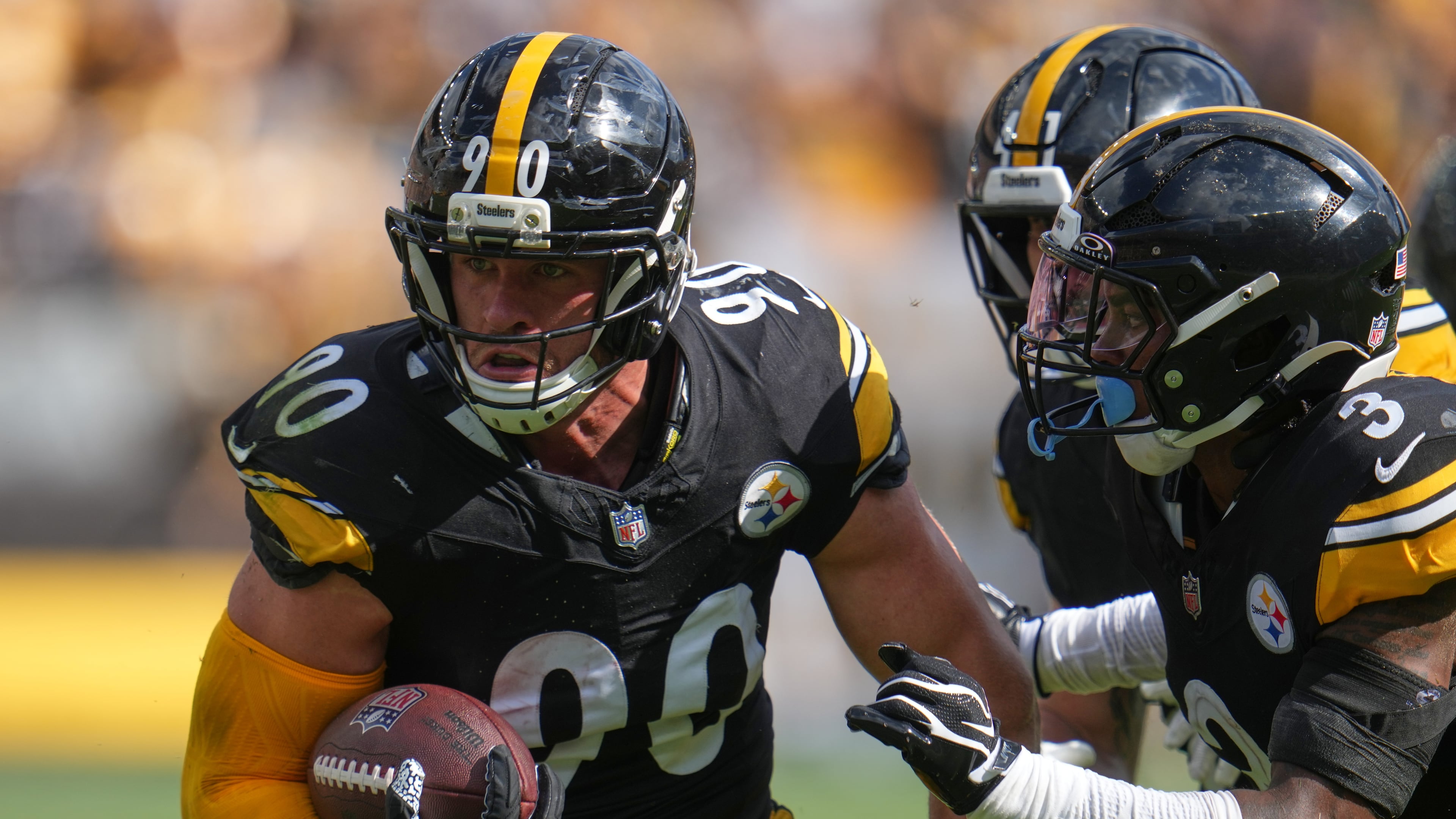 Pittsburgh Steelers outside linebacker T.J. Watt (90) returns an interception in for a touchdown during an NFL football game, Sunday, Sept. 13, 2026, in Pittsburgh. (AP Photo/Gene J. Puskar)