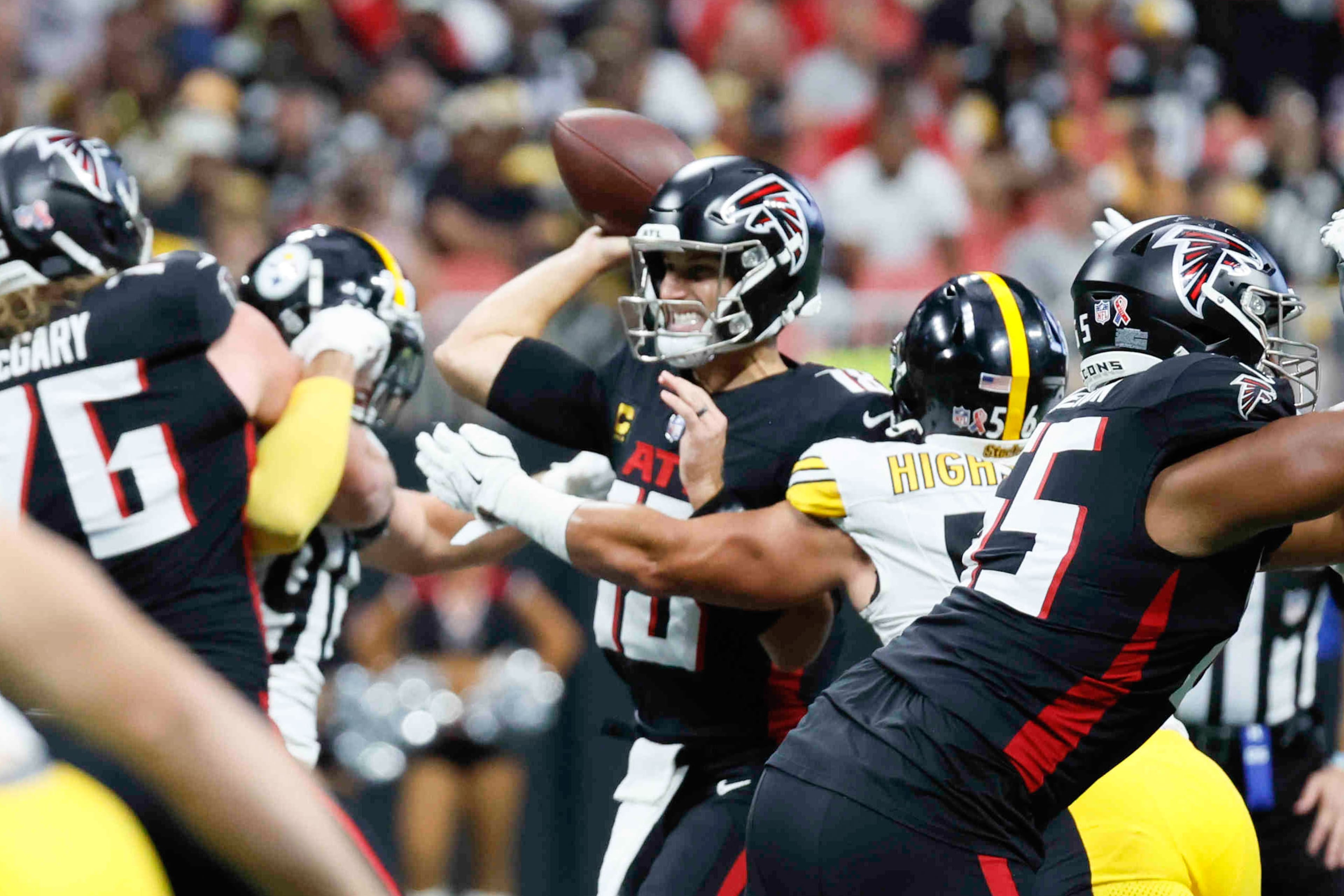 Falcons quarterback Kirk Cousins attempts to pass under pressure during the first half of an NFL football game against the Steelers on Sunday, Sept. 8, at Mercedes-Benz Stadium in Atlanta.
(Miguel Martinez/ AJC)