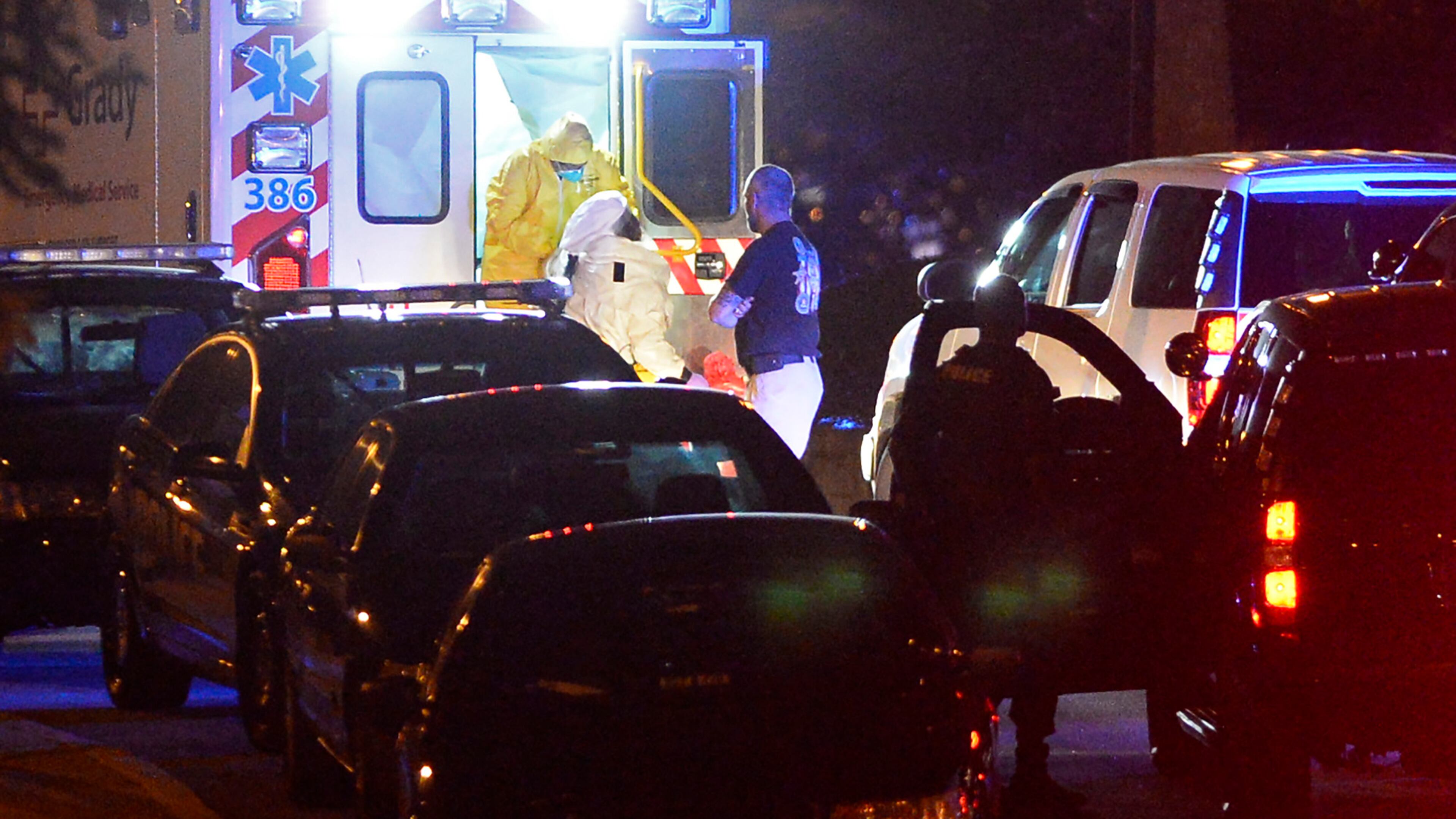An ambulance carrying Amber Vinson, the second health care worker to be diagnosed with Ebola in Texas, arrives at Emory University Hospital on Wednesday, Oct. 15, 2014 in Atlanta. A joint emergency isolation unit administered by Emory University Hospital and the Centers for Disease Control and Prevention has successfully treated two Americans and is currently treating a third. (AP Photo/David Tulis)