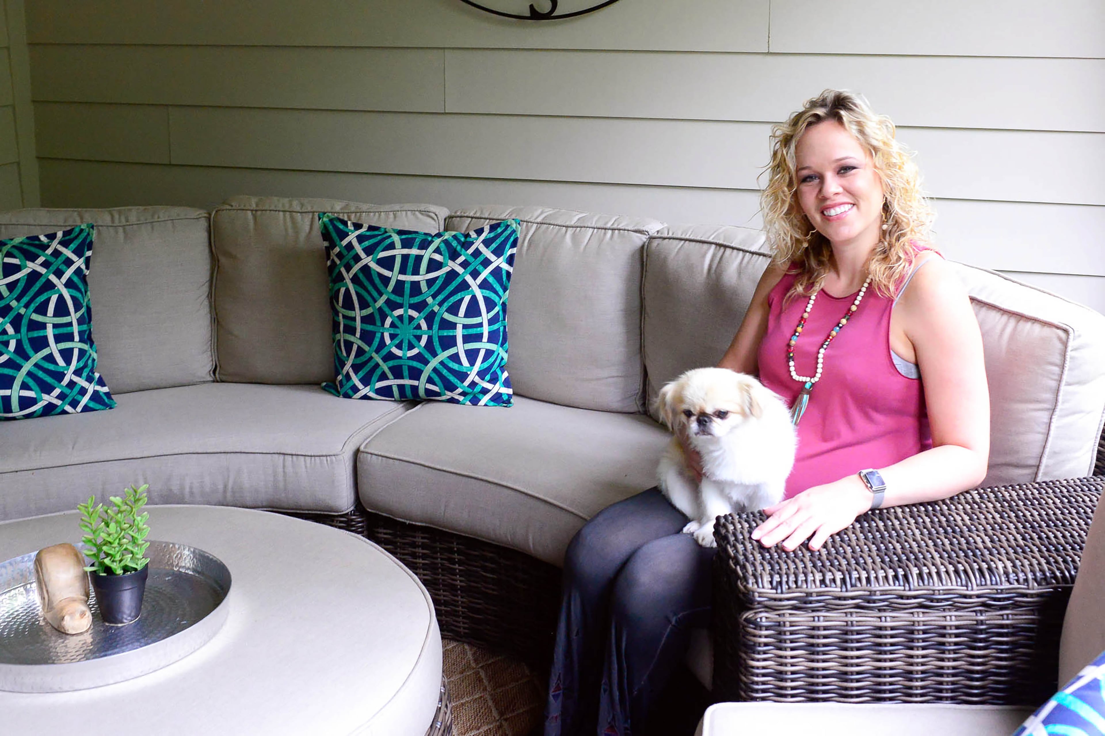 Leslie McCoy, owner of Image Makers Salon Suites in Suwanee, with her dog, Maya, decorated the covered patio with a curved set from Georgia Patio. Her son, Lincoln, was born in July 2017. Text by Lori Johnson and Kelsey E. Green/Fast Copy News Service.
(Christopher Oquendo Photography/www.ophotography.com)