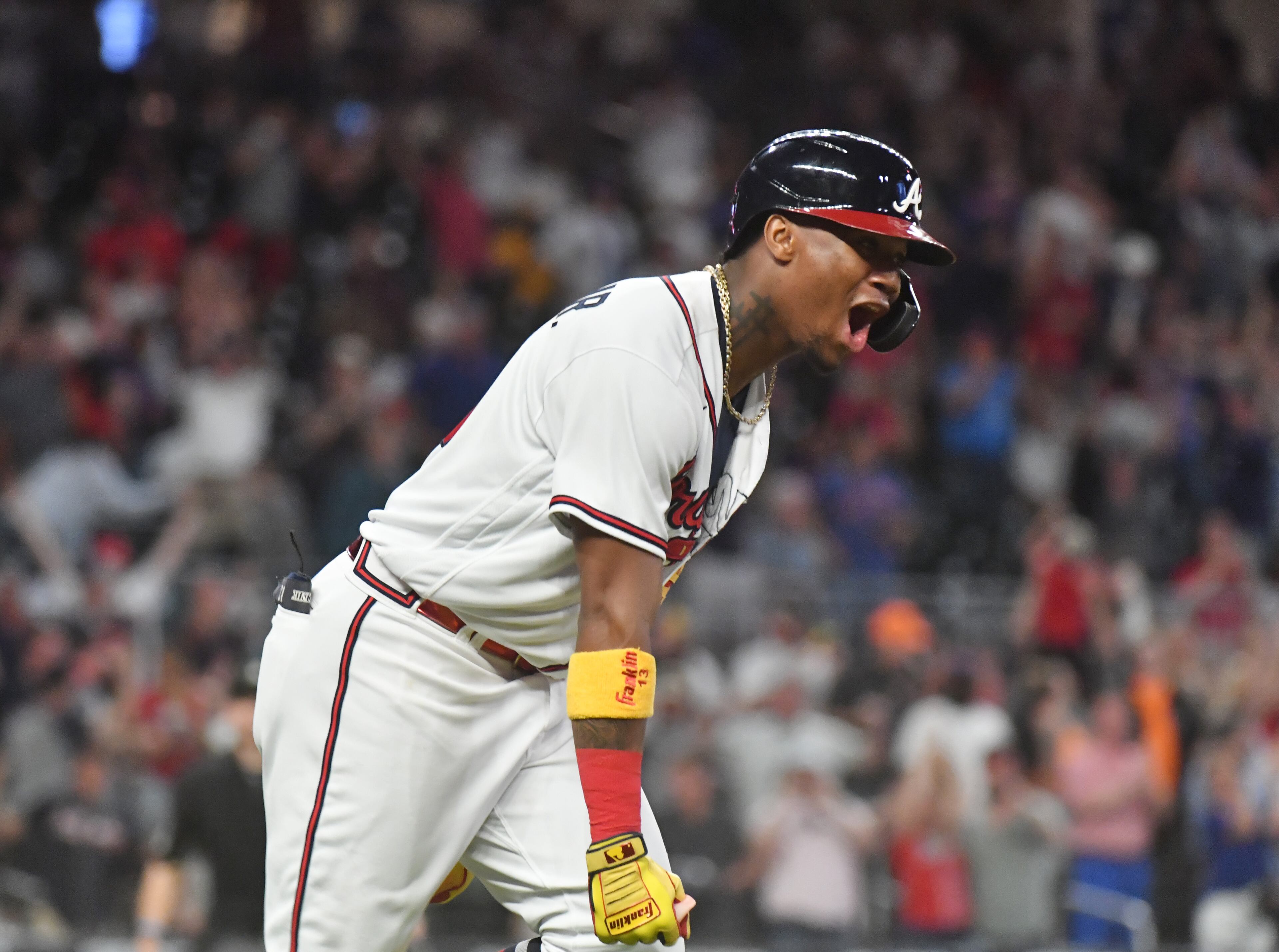 Braves right fielder Ronald Acuna Jr. (13) reacts after he hit the game-winning solo home run in the 9th inning at Truist Park on Wednesday, May 19, 2021. The Braves won 5-4 over the New York Mets. (Hyosub Shin / Hyosub.Shin@ajc.com)