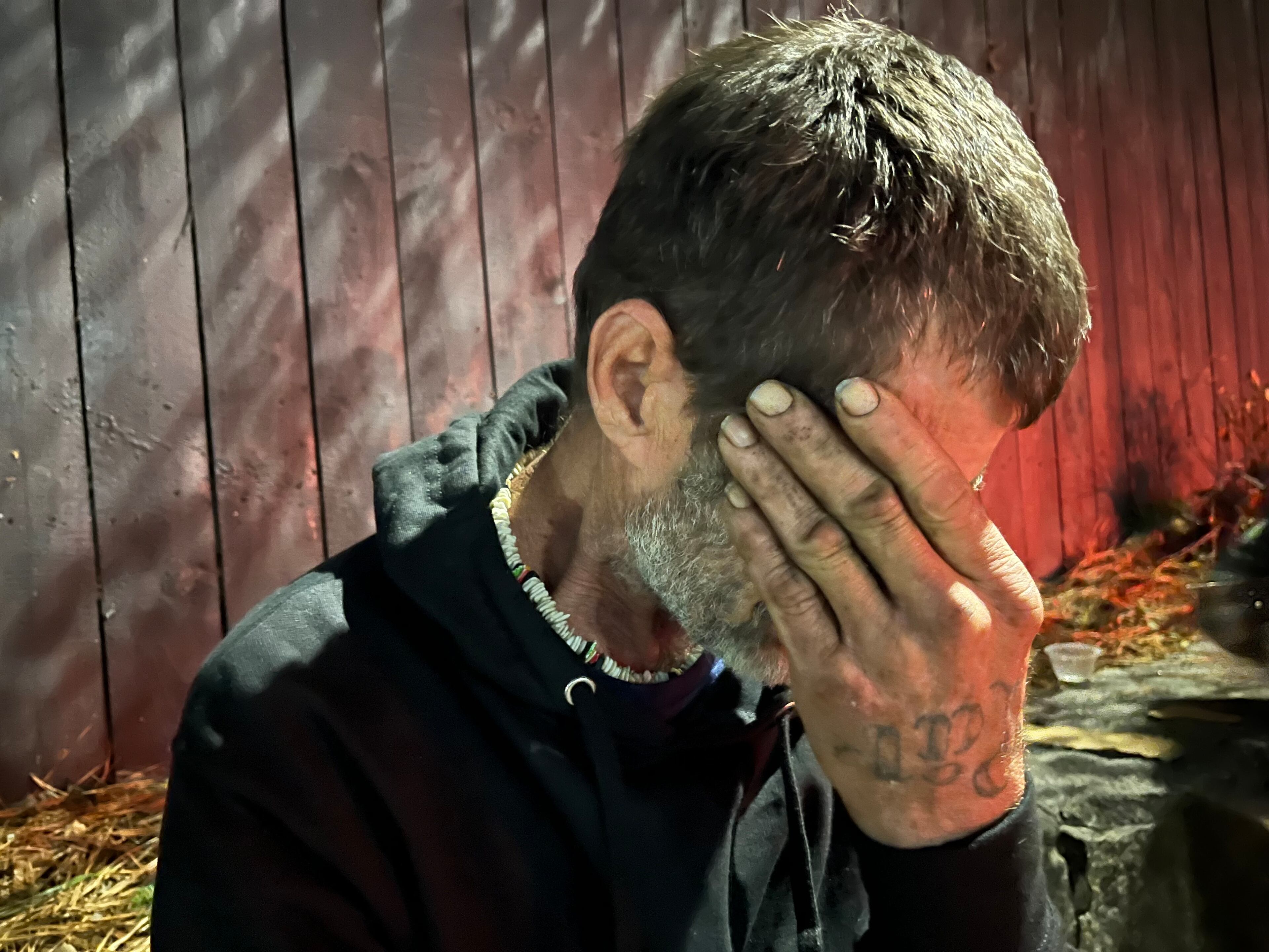 A man who only gave his nickname, Tattoo, lived at The Hill, a large encampment of homeless people on state property in Atlanta near the intersection of Buford Highway and Lenox Road. In 2022, a large brush fire raged across much of the Hill, destroying shelters. Officials later cleared people from living in the area. MATT KEMPNER / AJC