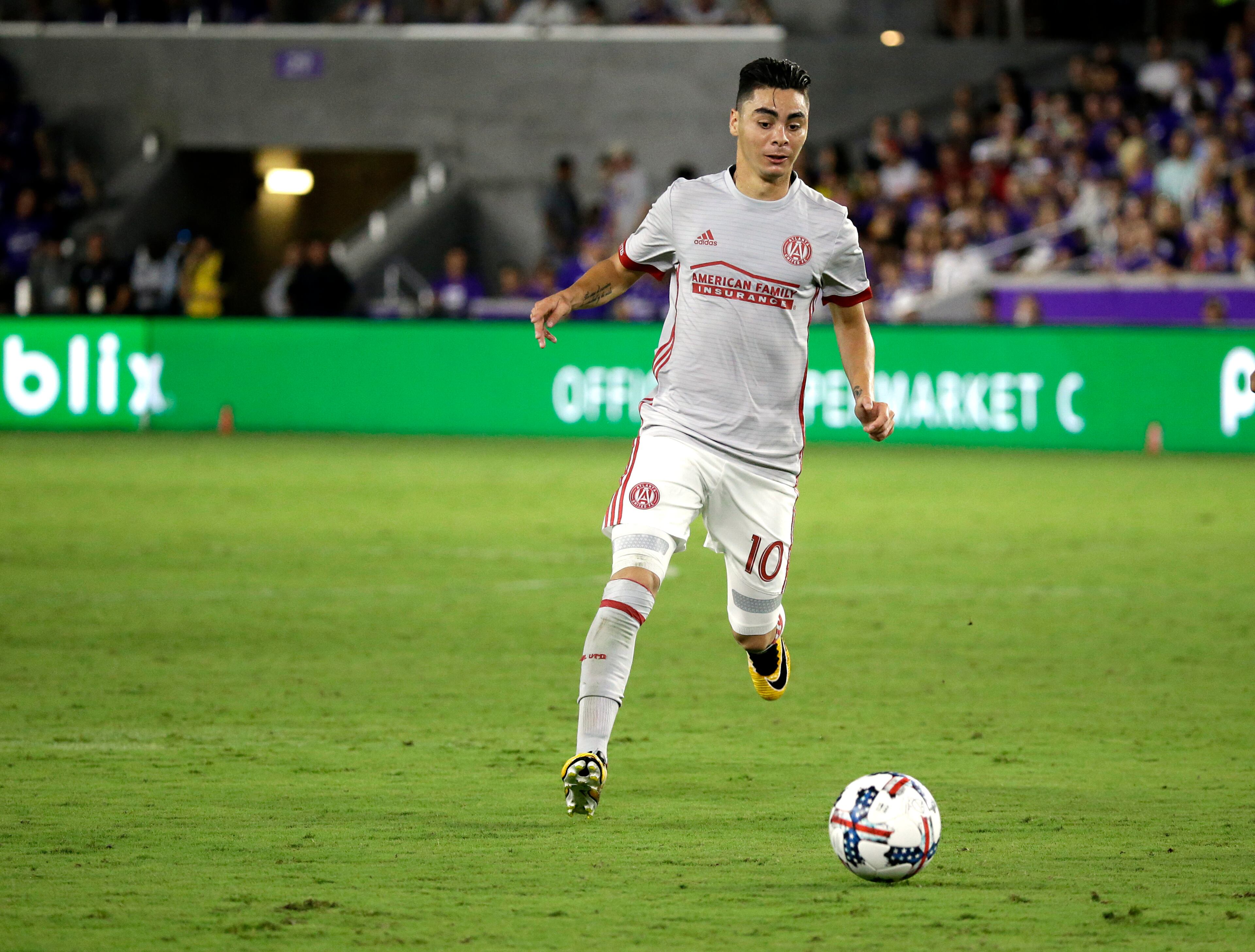 Atlanta United's Miguel Almiron (10) moves the ball against Orlando City during the second half of an MLS soccer match, Friday, July 21, 2017, in Orlando, Fla. Atlanta United won 1-0. (AP Photo/John Raoux)