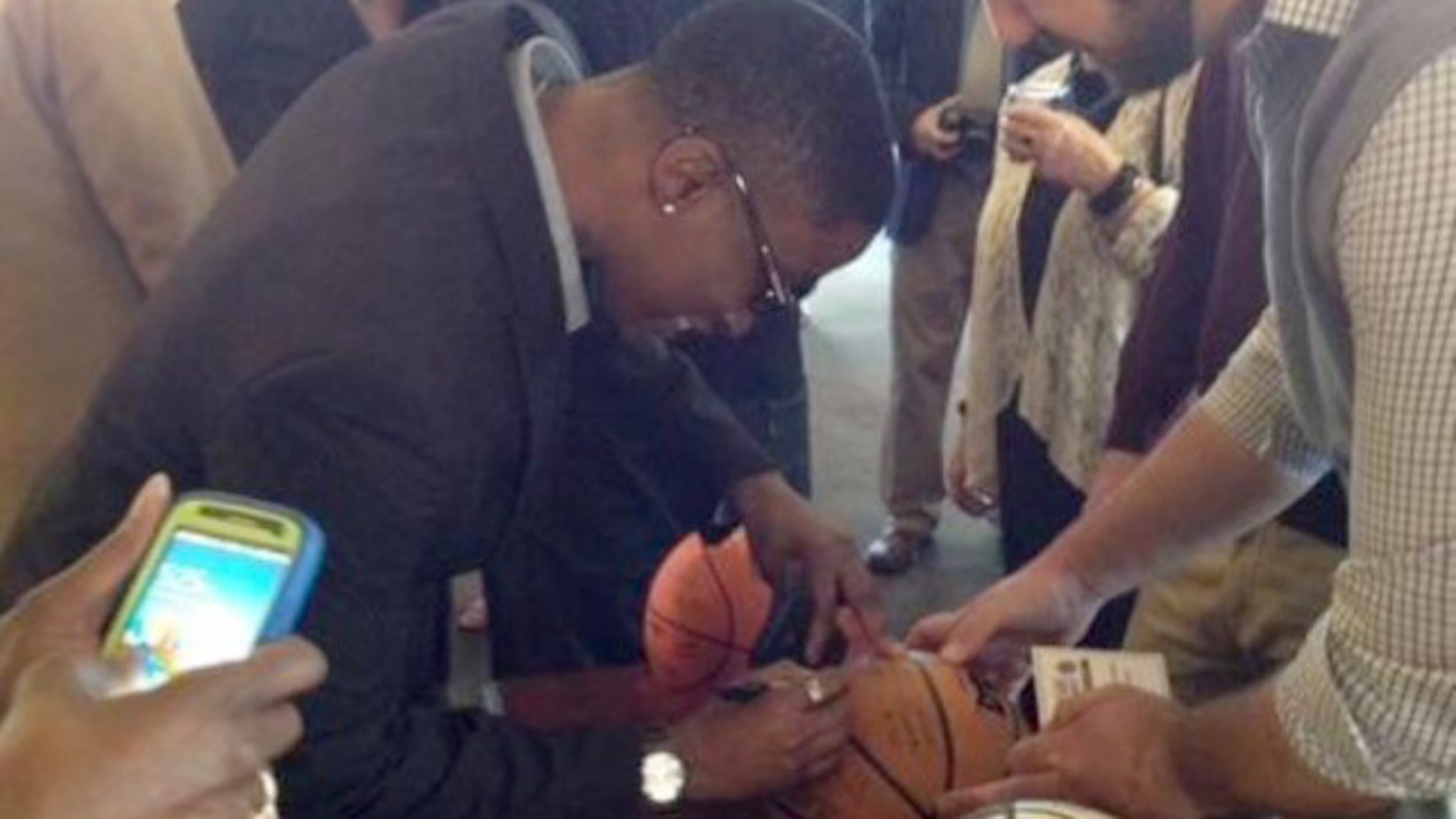 Latonya McMorris autographs basketballs at the Women's Final Four in 2001, where her team -- the Lady Bears of Missouri State, finished in the top four. She says she learned some great skills on the court -- leadership, teamwork, and perseverance. Courtesy of Latonya McMorris
