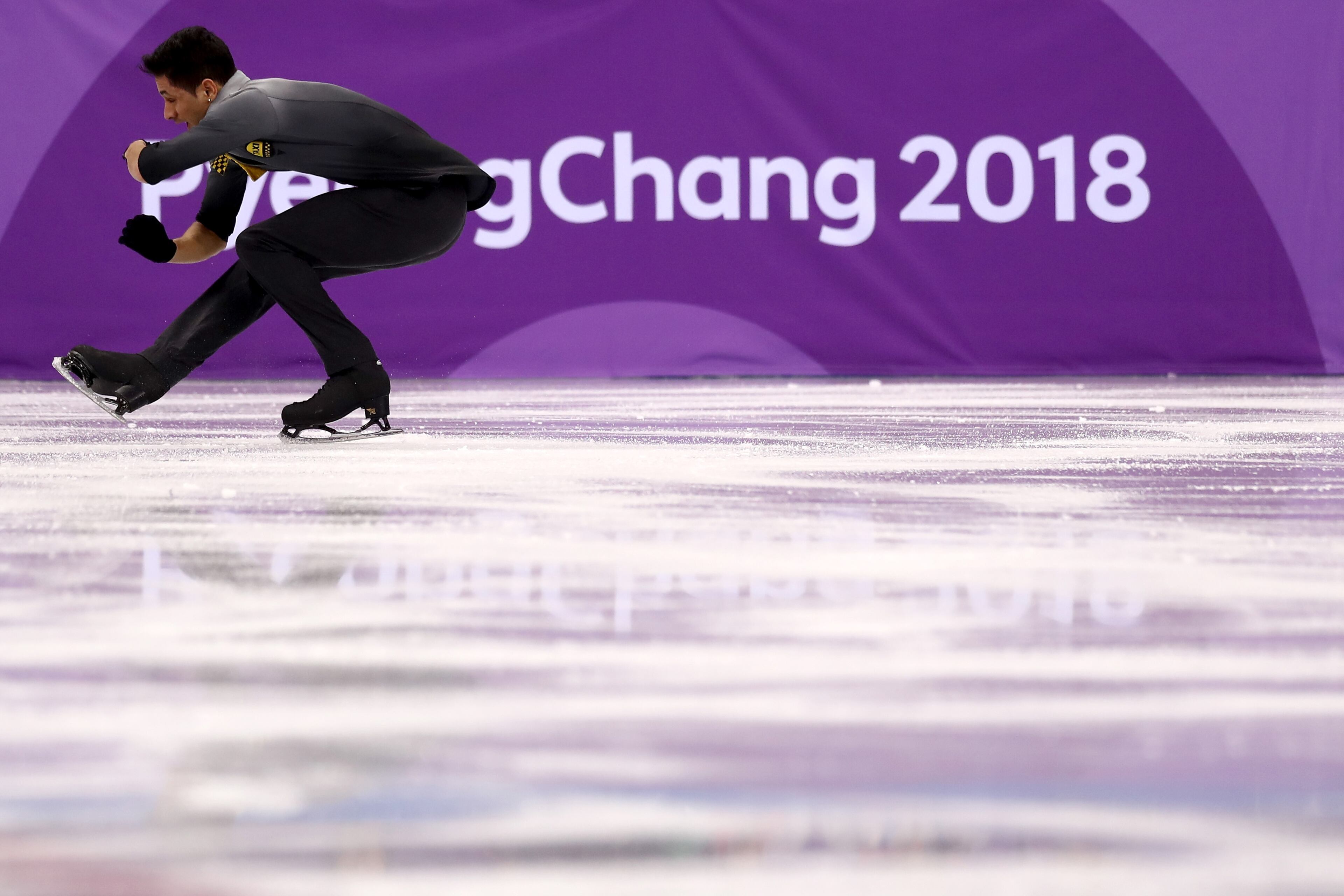 GANGNEUNG, SOUTH KOREA - FEBRUARY 09: Chafik Besseghier of France competes in the Figure Skating Team Event - Men's Single Skating Short Program during the PyeongChang 2018 Winter Olympic Games at Gangneung Ice Arena on February 9, 2018 in Gangneung, South Korea. (Photo by Ronald Martinez/Getty Images)