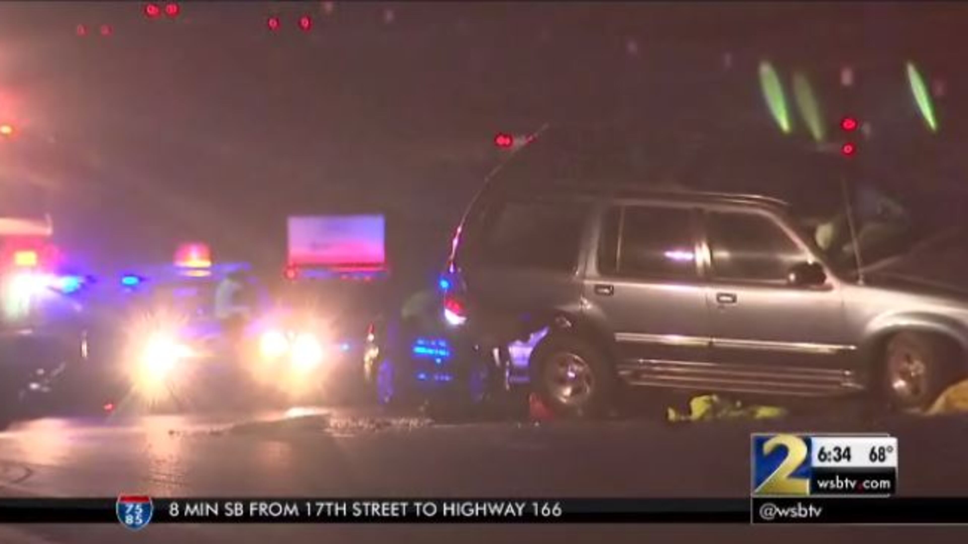 An Alpharetta man was hit and killed moments after getting out of his SUV Monday in Cobb County. (Credit: Channel 2 Action News)