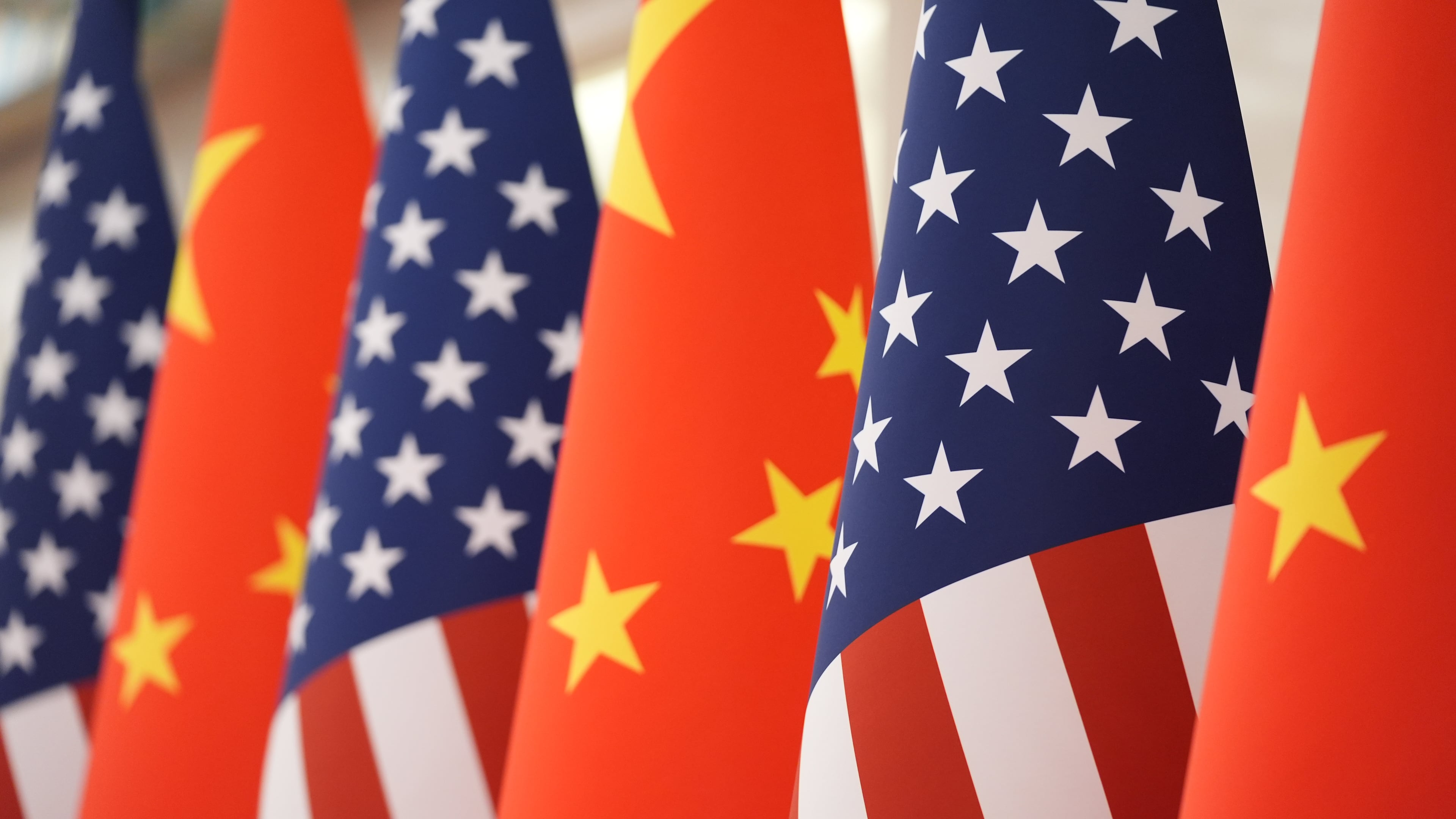 FILE - The U.S. and Chinese flag at the Great Hall of the People prior to the state dinner of President Donald Trump and Chinese President Xi Jinping on May 14, 2026, in Beijing. (AP Photo/Mark Schiefelbein, File)