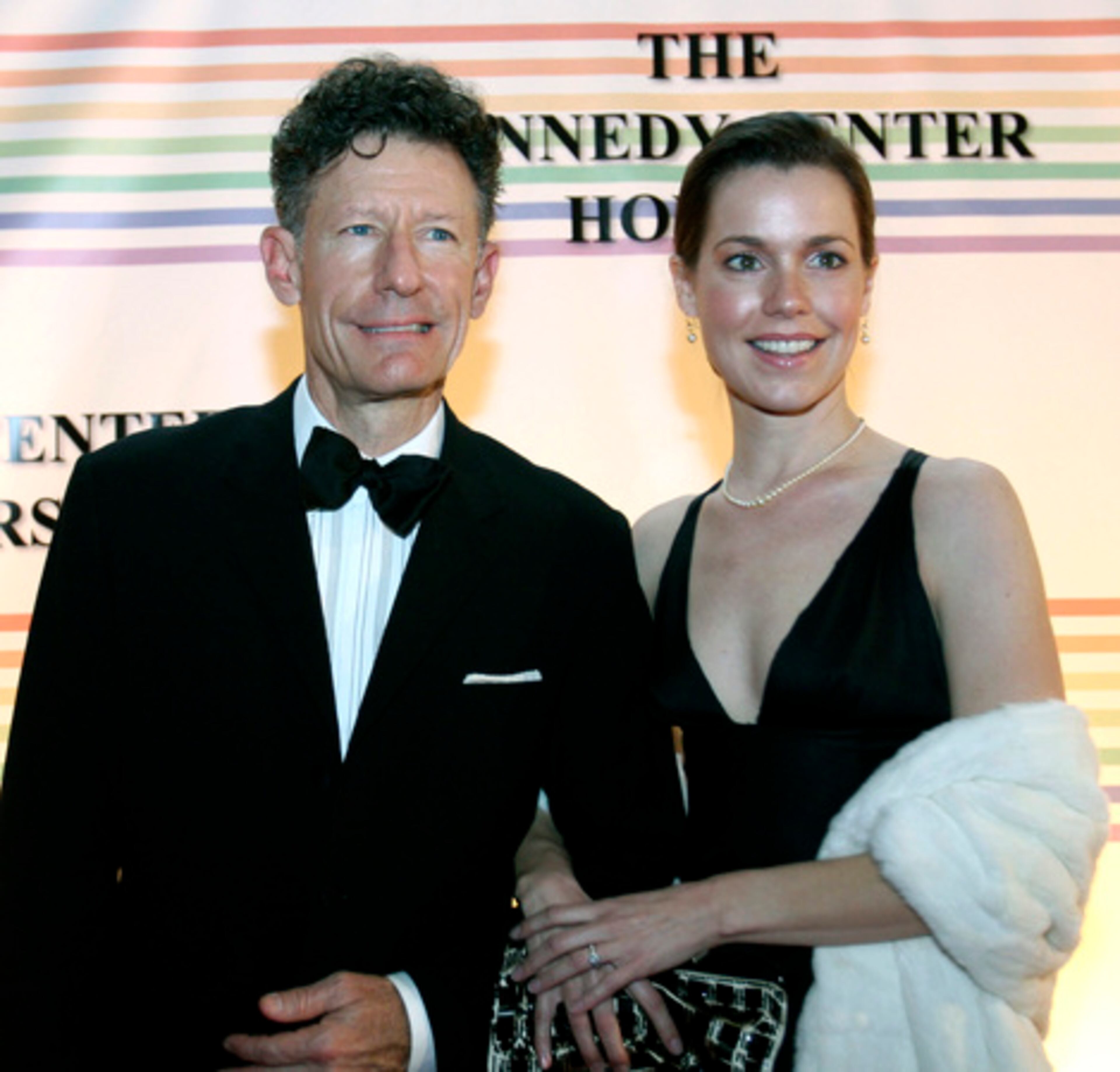 Singer Lyle Lovett and his girlfriend, April Kimble.